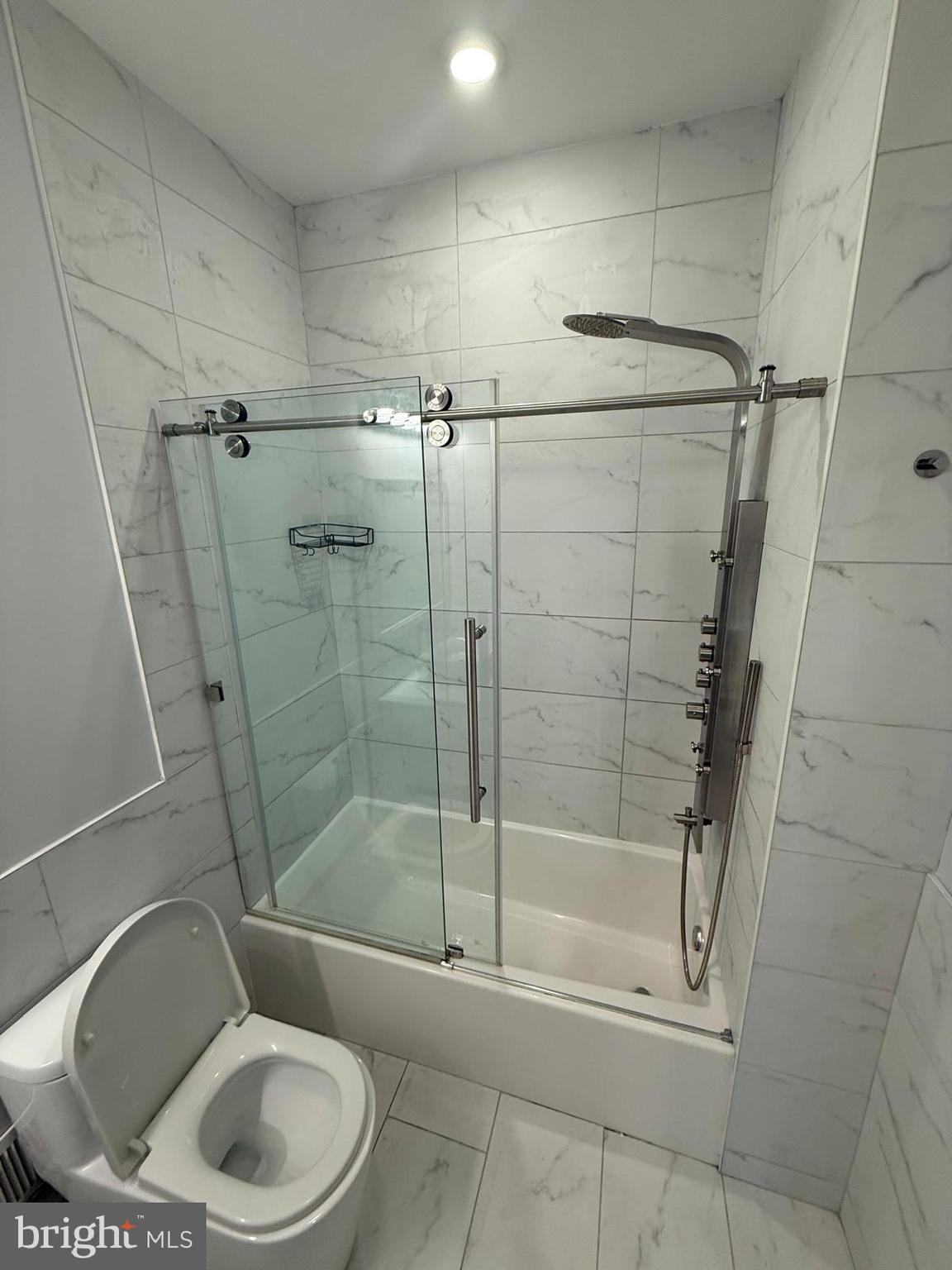 2309 Cross Street Philadelphia, PA 19146 - Photo 27 of 37 a bathroom with a toilet and a shower