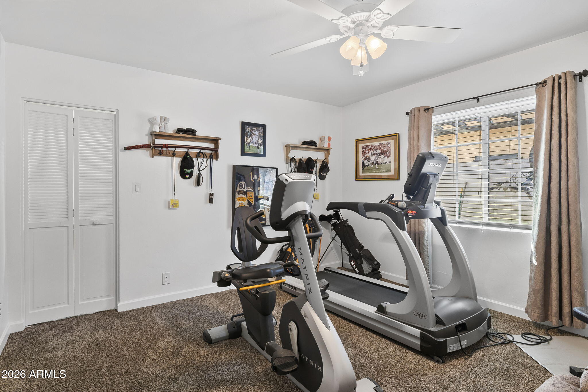 1607 West Whitton Avenue Phoenix, AZ 85015 - Photo 22 of 45 a view of a room with gym equipment