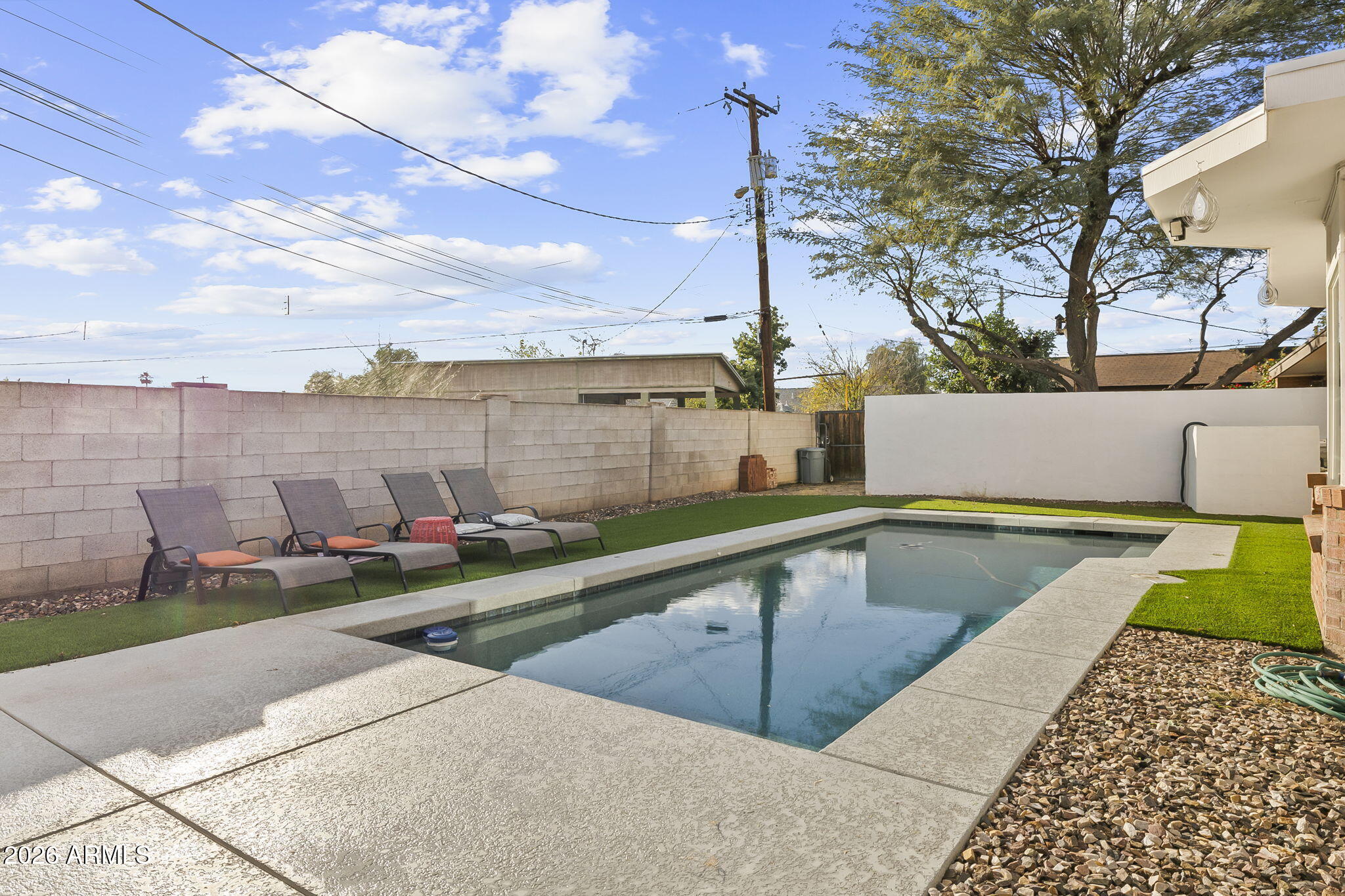 1607 West Whitton Avenue Phoenix, AZ 85015 - Photo 28 of 45 a view of a terrace with chairs