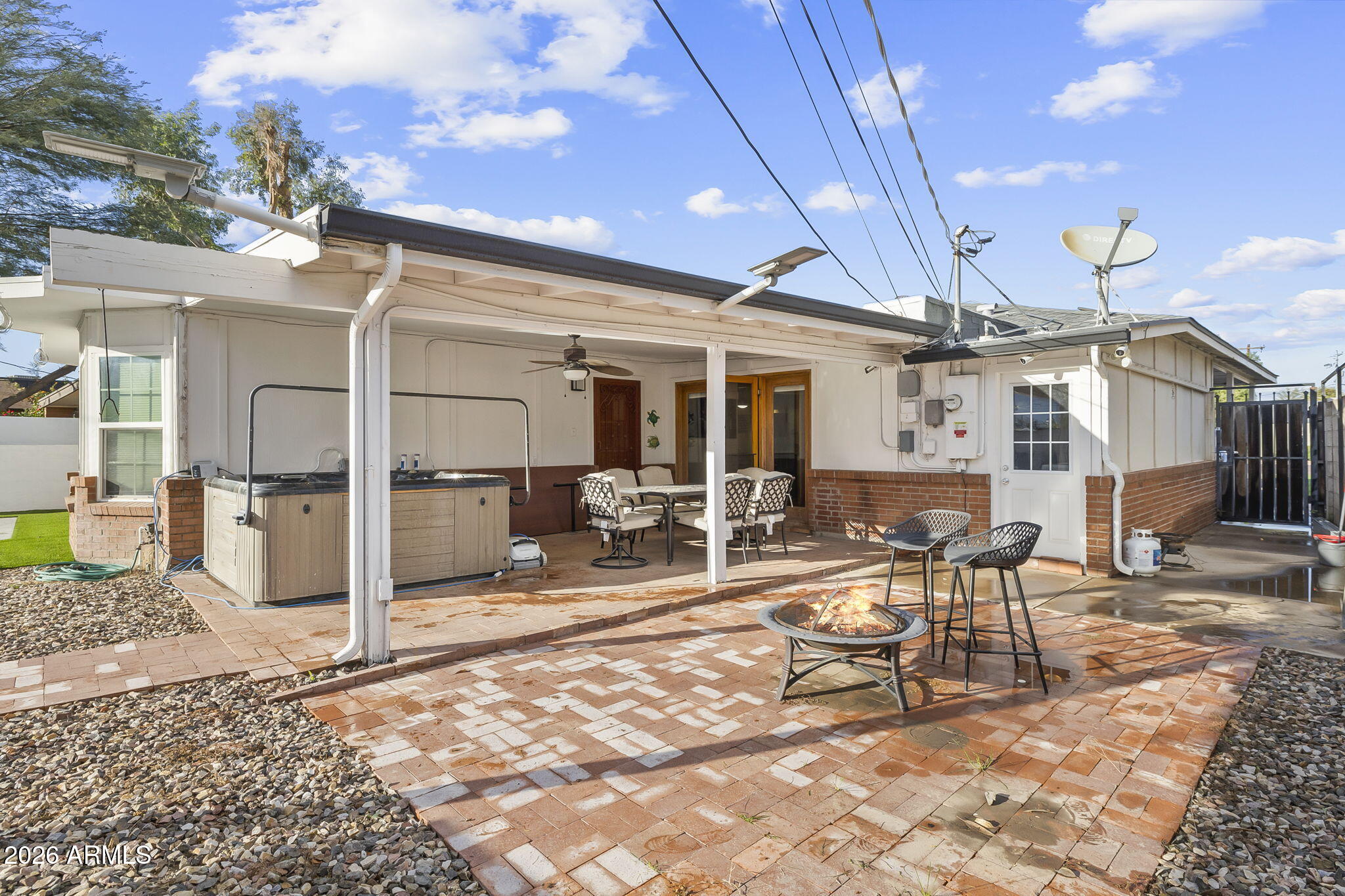 1607 West Whitton Avenue Phoenix, AZ 85015 - Photo 29 of 45 a view of a patio with table and chairs