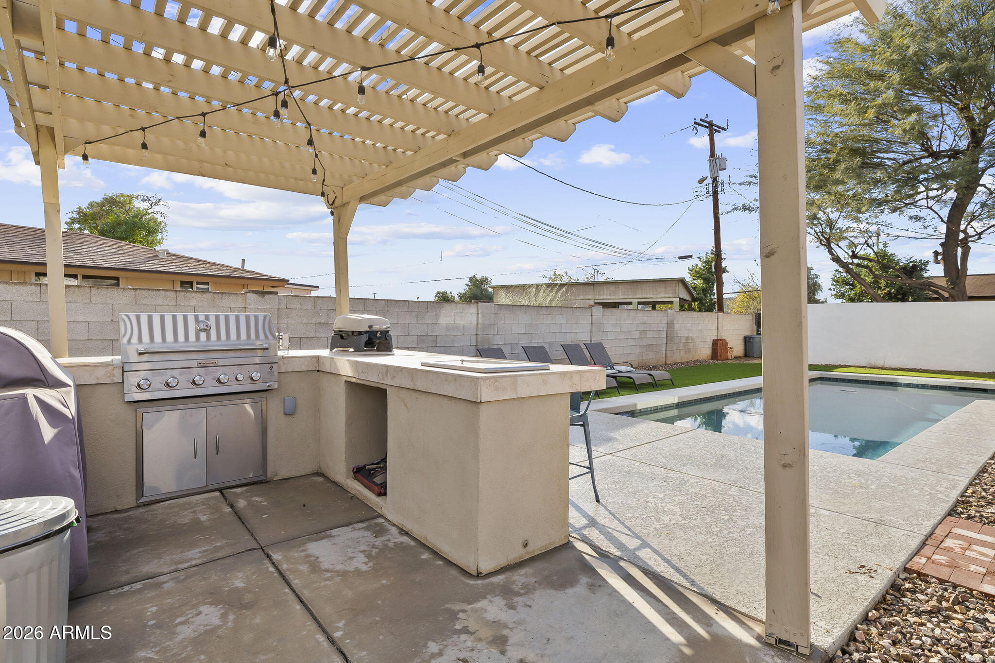 1607 West Whitton Avenue Phoenix, AZ 85015 - Photo 35 of 45 a view of a kitchen with a dishwasher and stove