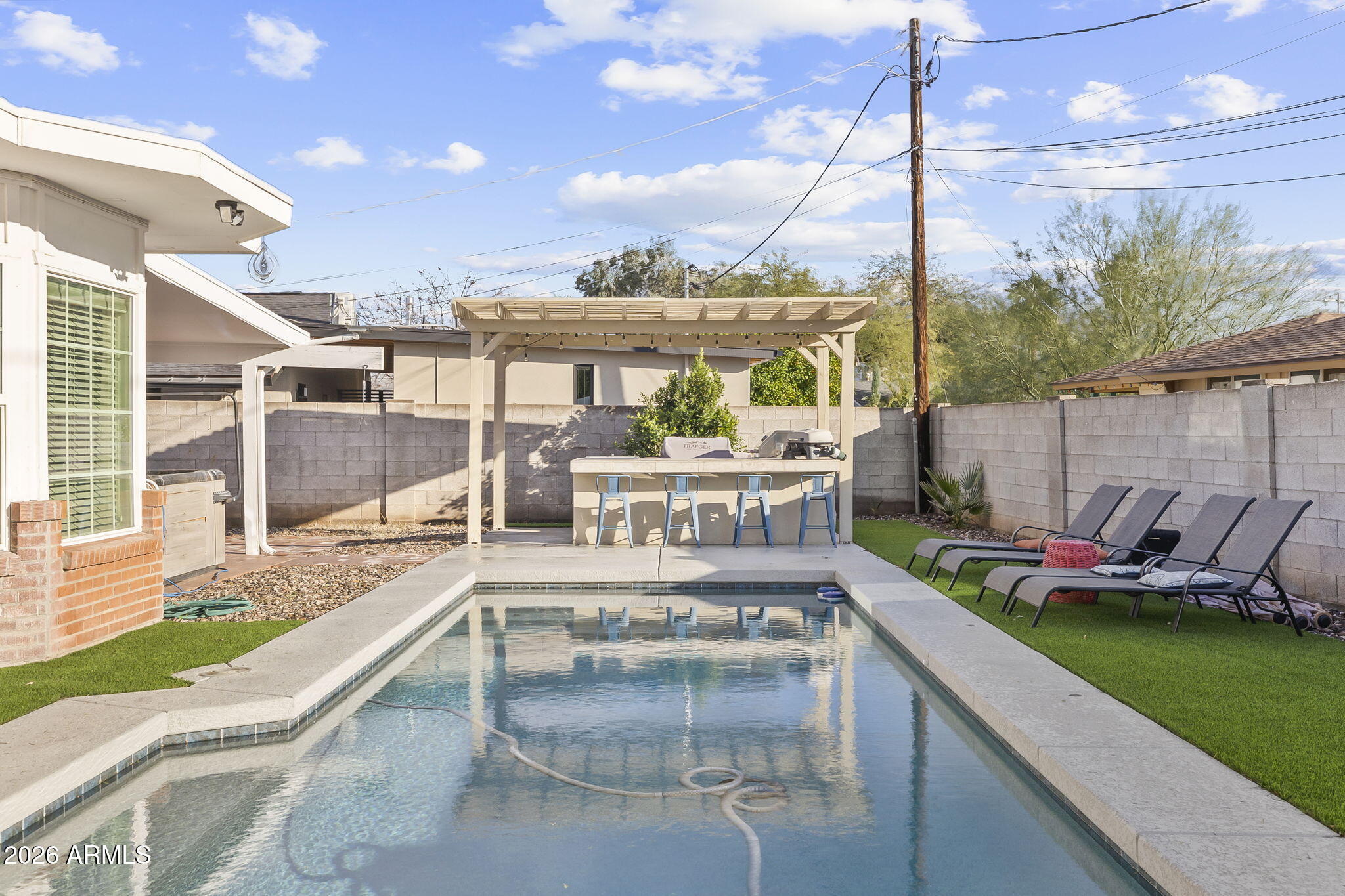 1607 West Whitton Avenue Phoenix, AZ 85015 - Photo 36 of 45 a view of a balcony with a patio