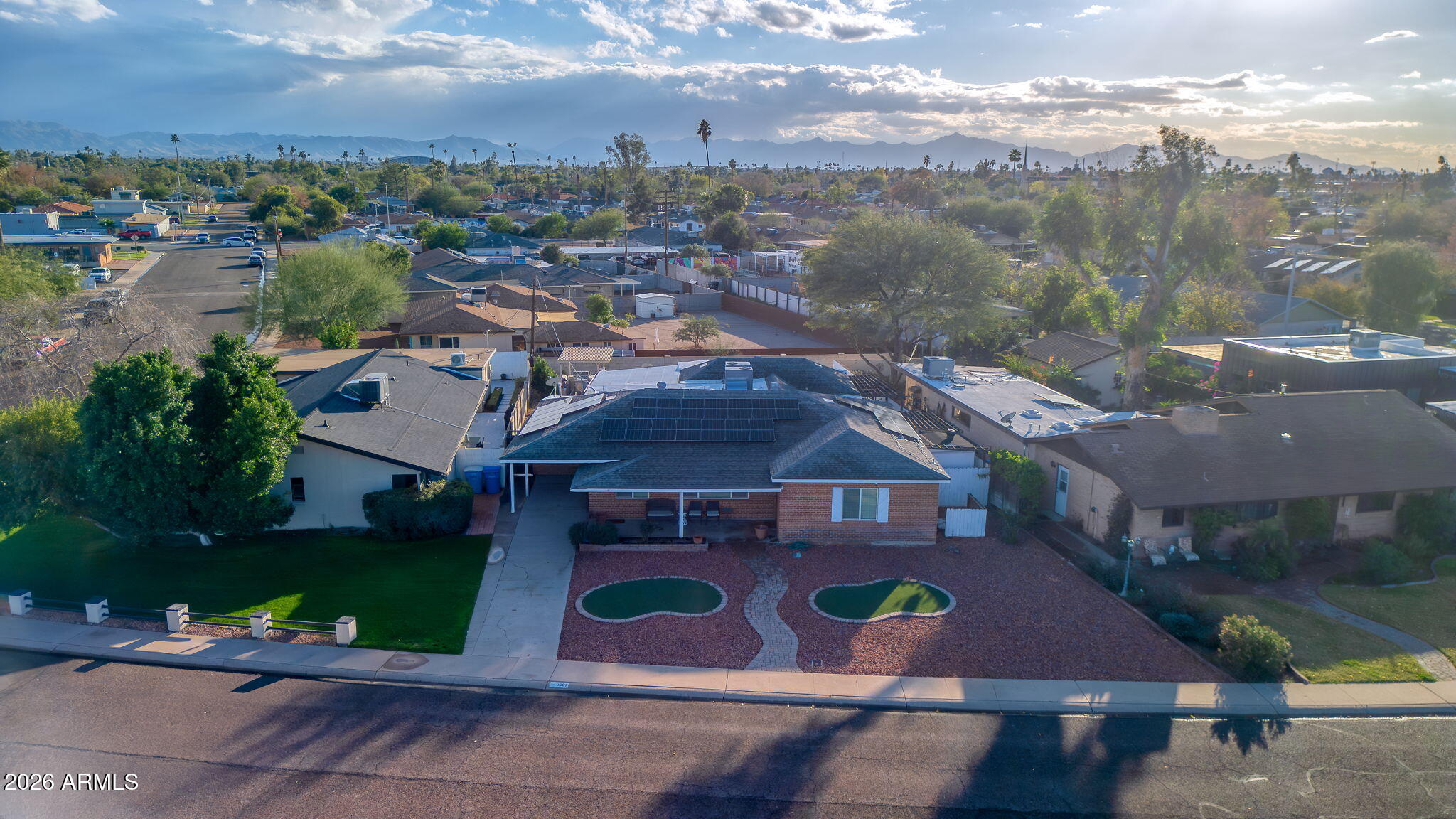 1607 West Whitton Avenue Phoenix, AZ 85015 - Photo 40 of 45 an aerial view of a house with yard