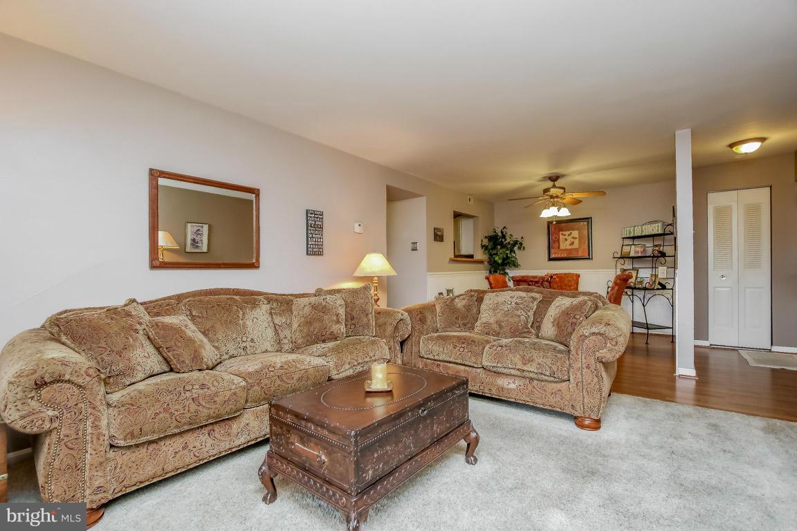 2572 Riva Road, Unit 16B Annapolis, MD 21401 - Photo 2 of 22 a living room with furniture and a couch