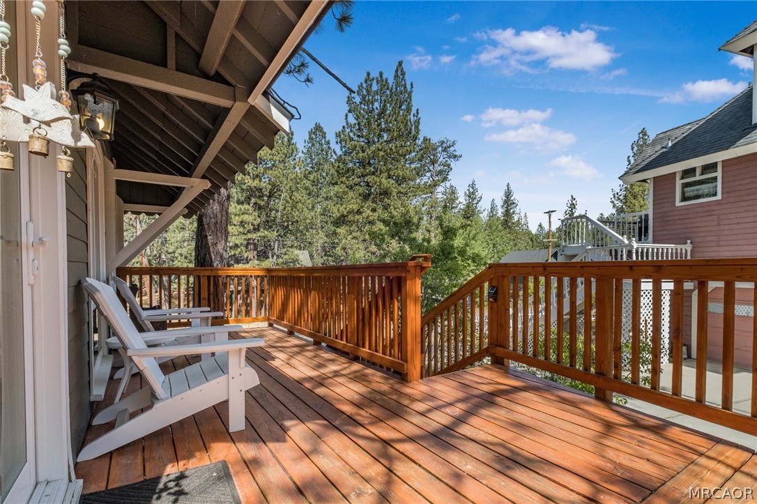 195 Elgin Road Big Bear Lake, CA 92315 - Photo 27 of 45 a view of deck with wooden floor and outdoor seating