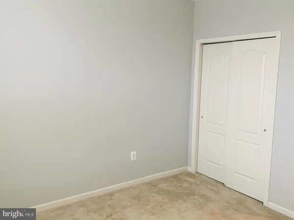 a view of a room with an empty space