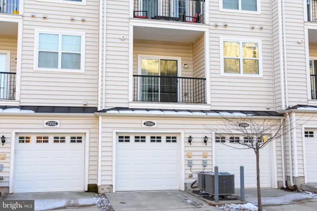 a view of empty room with windows