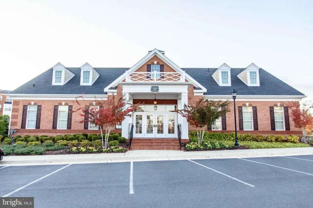 a view of building with yard and outdoor