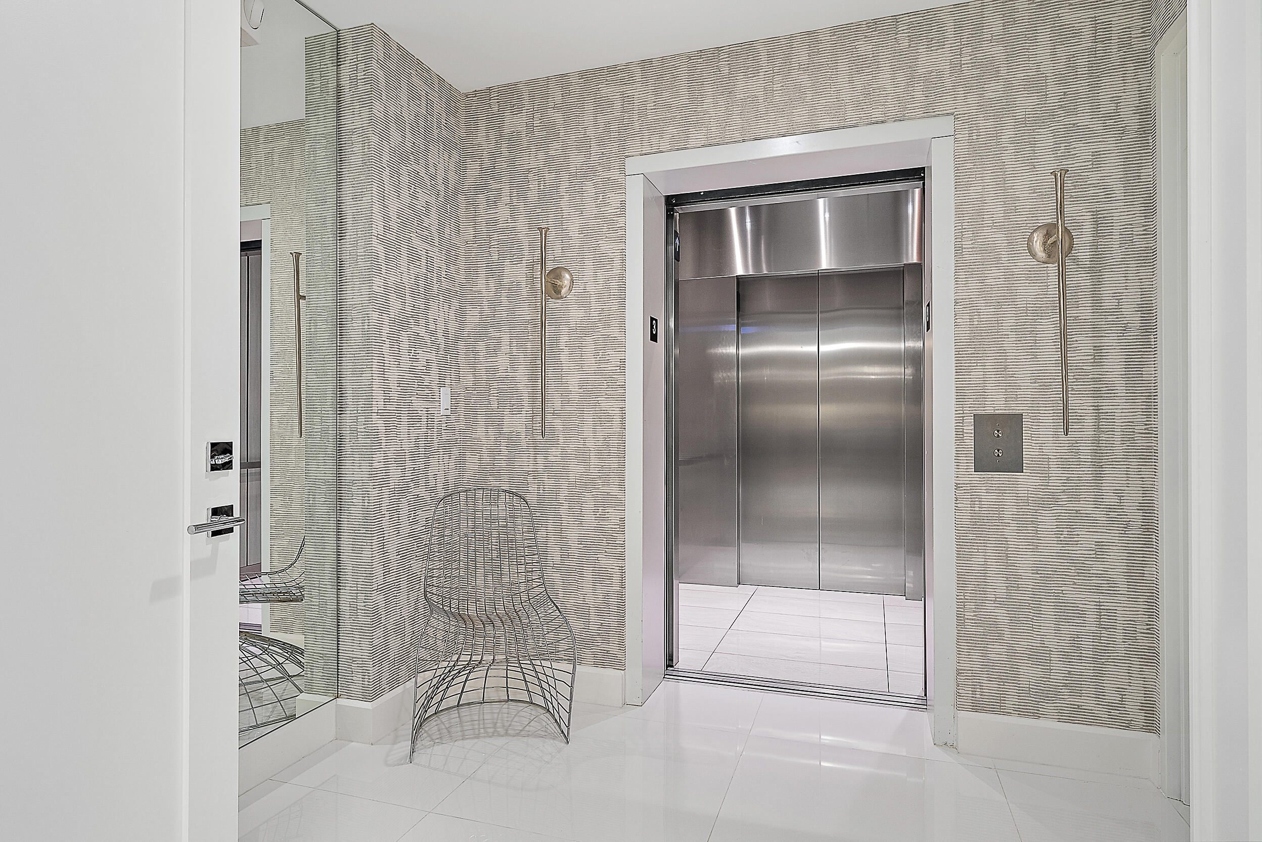 2700 Donald Ross Road, Unit 306 Palm Beach Gardens, FL 33410 - Photo 11 of 43 Elevator into the unit
