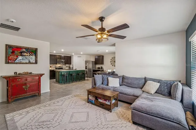 a view of a hallway to rooms