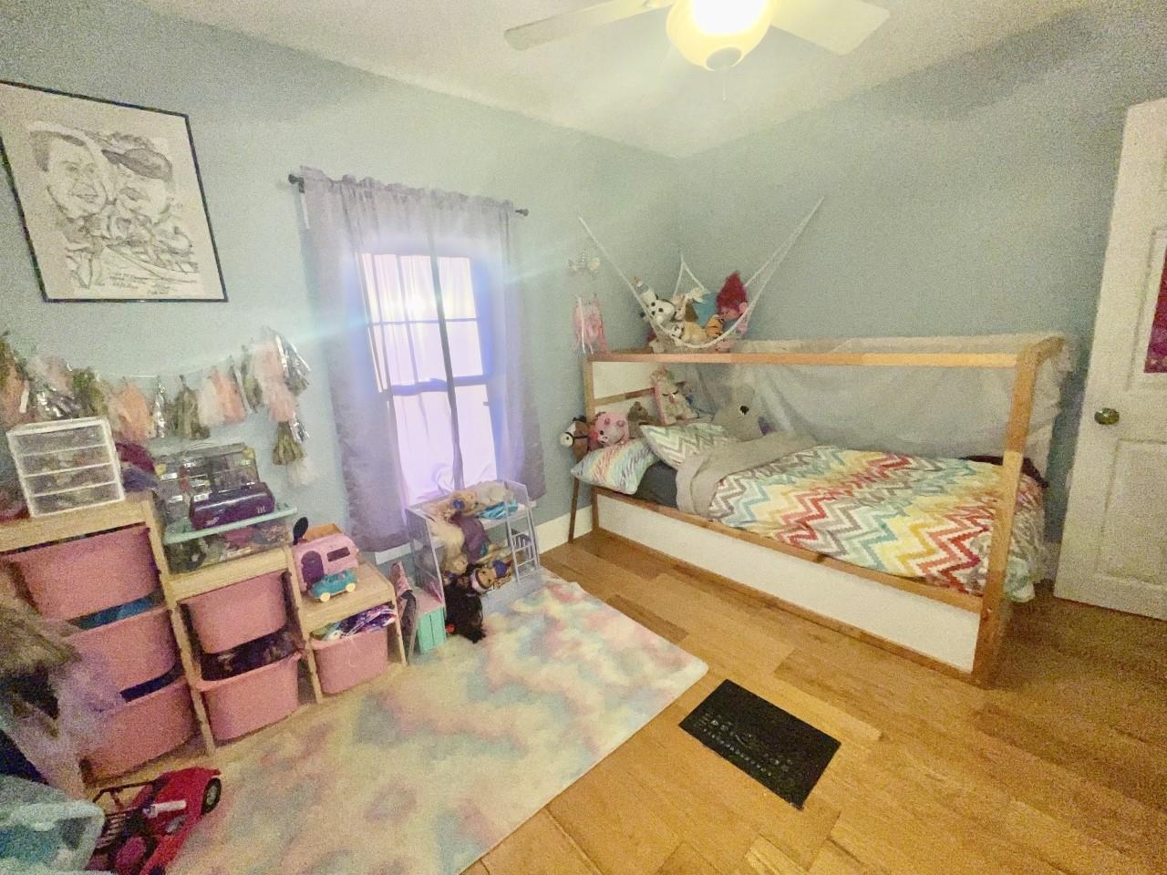3669 Scenic Bluff Road Thomson, IL 61285 - Photo 21 of 38 a bedroom with a bed and furniture
