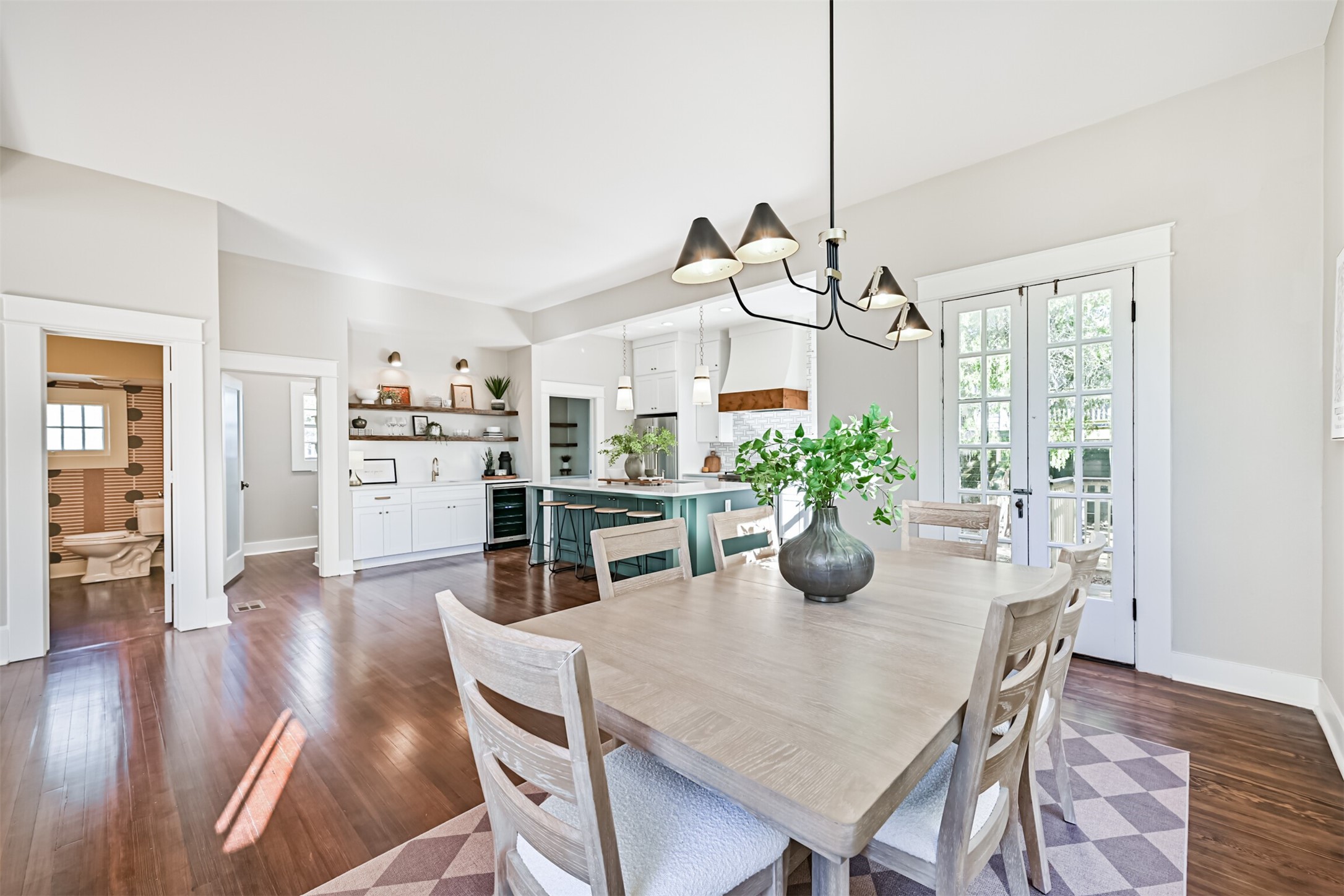 1310 Rosenberg Street Galveston, TX 77550 - Photo 13 of 50 a view of a dining room with furniture window and wooden floor