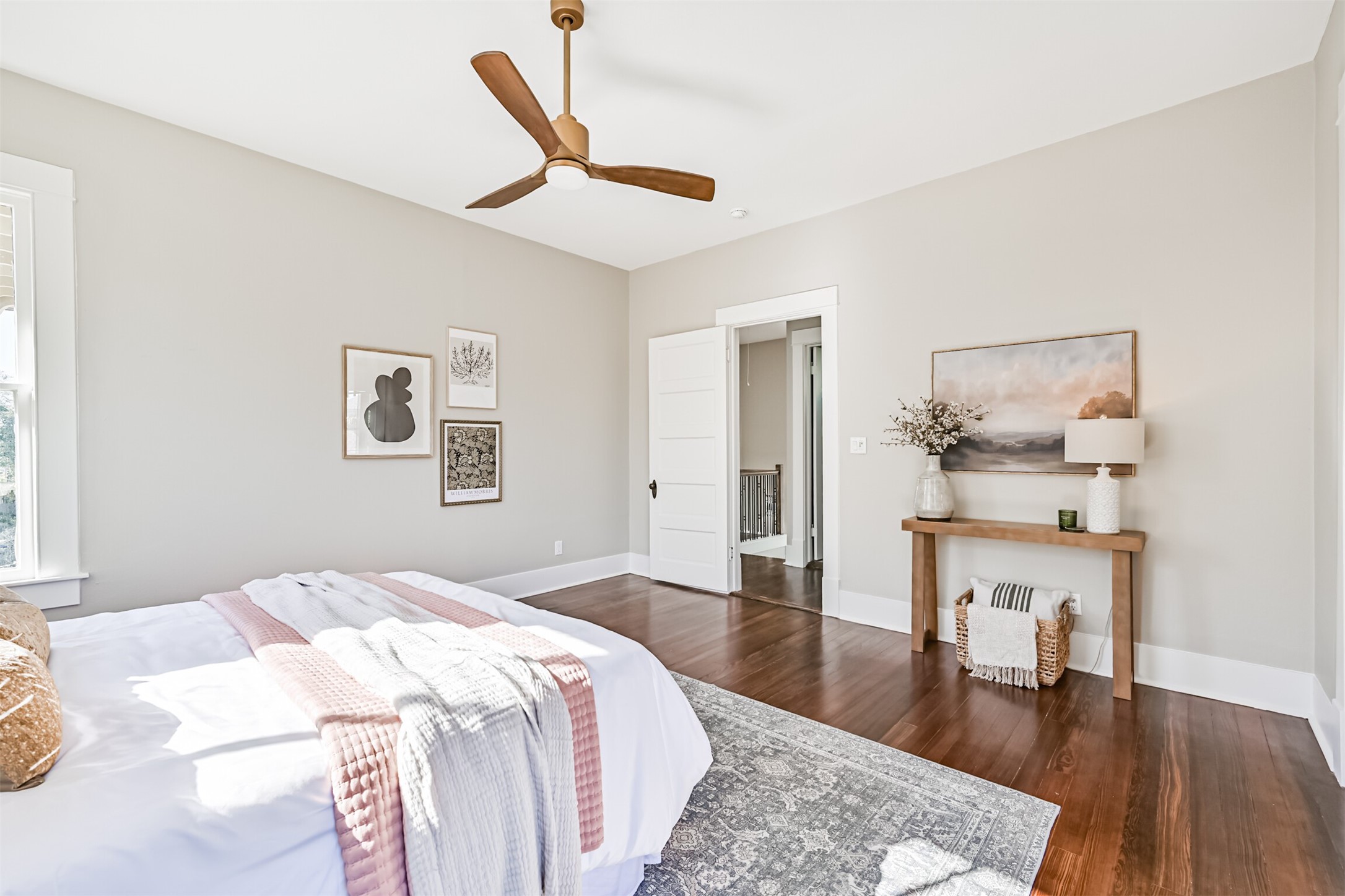 1310 Rosenberg Street Galveston, TX 77550 - Photo 18 of 50 a bedroom with a bed and a table