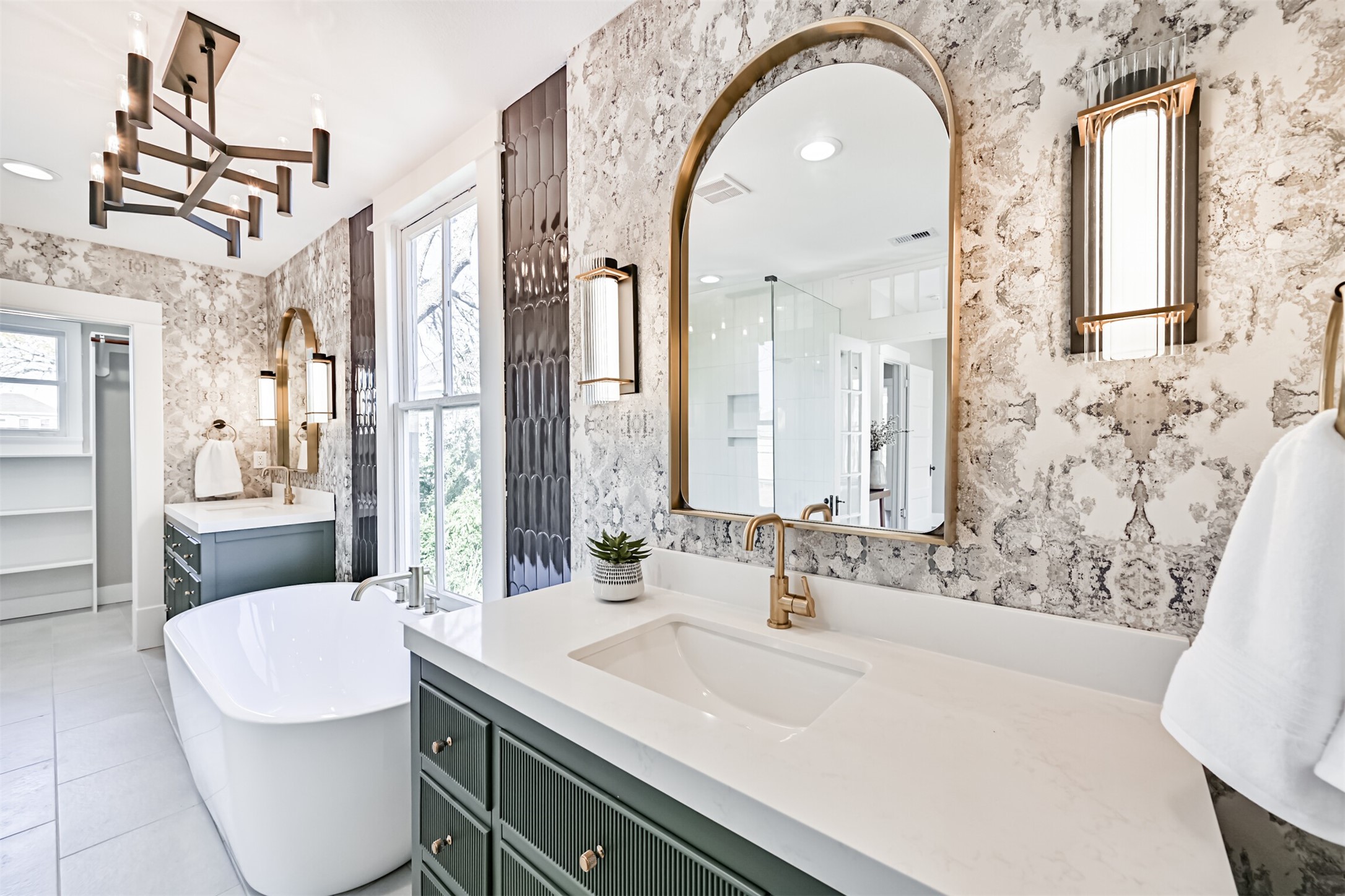1310 Rosenberg Street Galveston, TX 77550 - Photo 20 of 50 a bathroom with a sink and a mirror