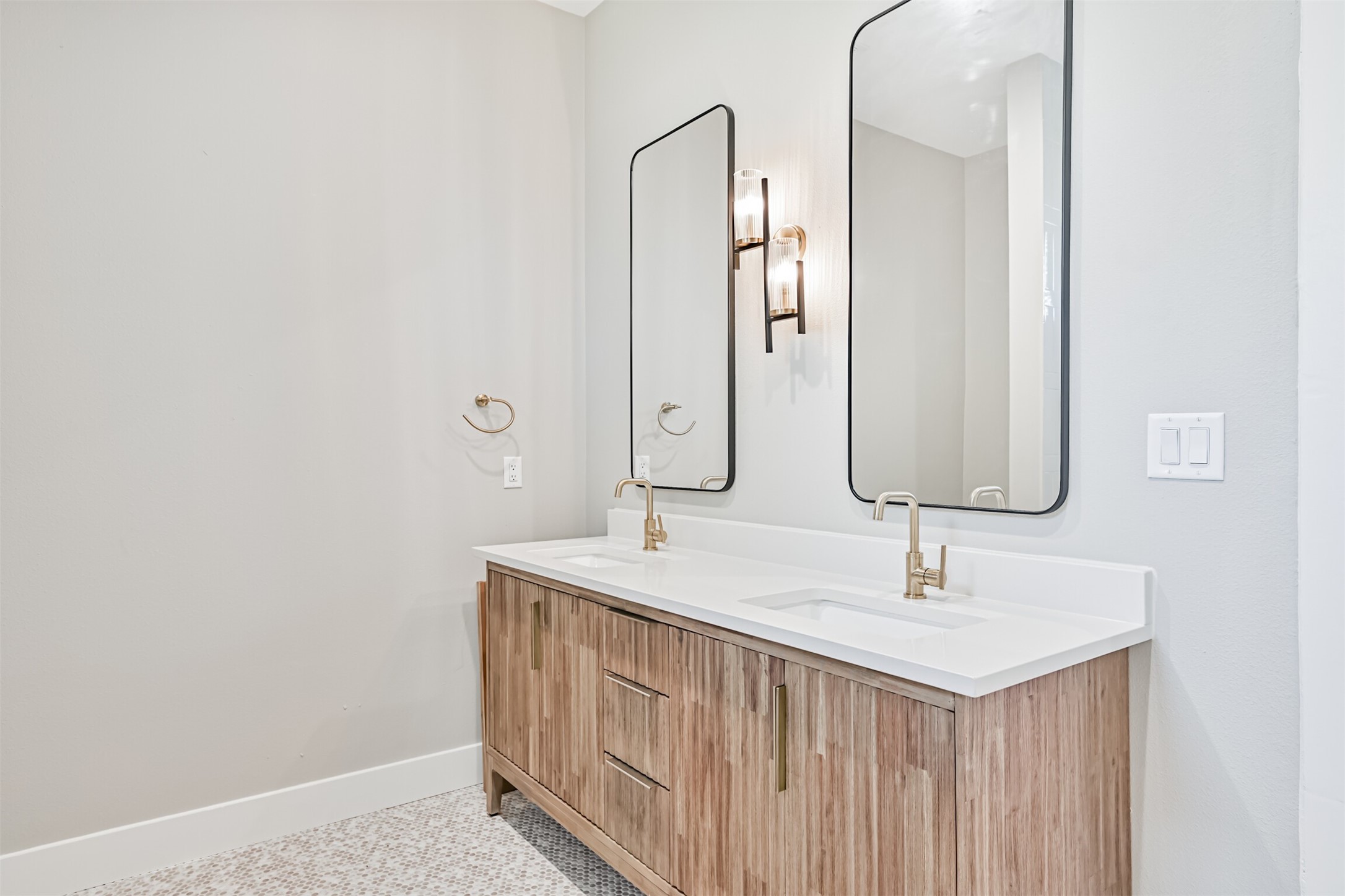 1310 Rosenberg Street Galveston, TX 77550 - Photo 30 of 50 a bathroom with a sink and a mirror