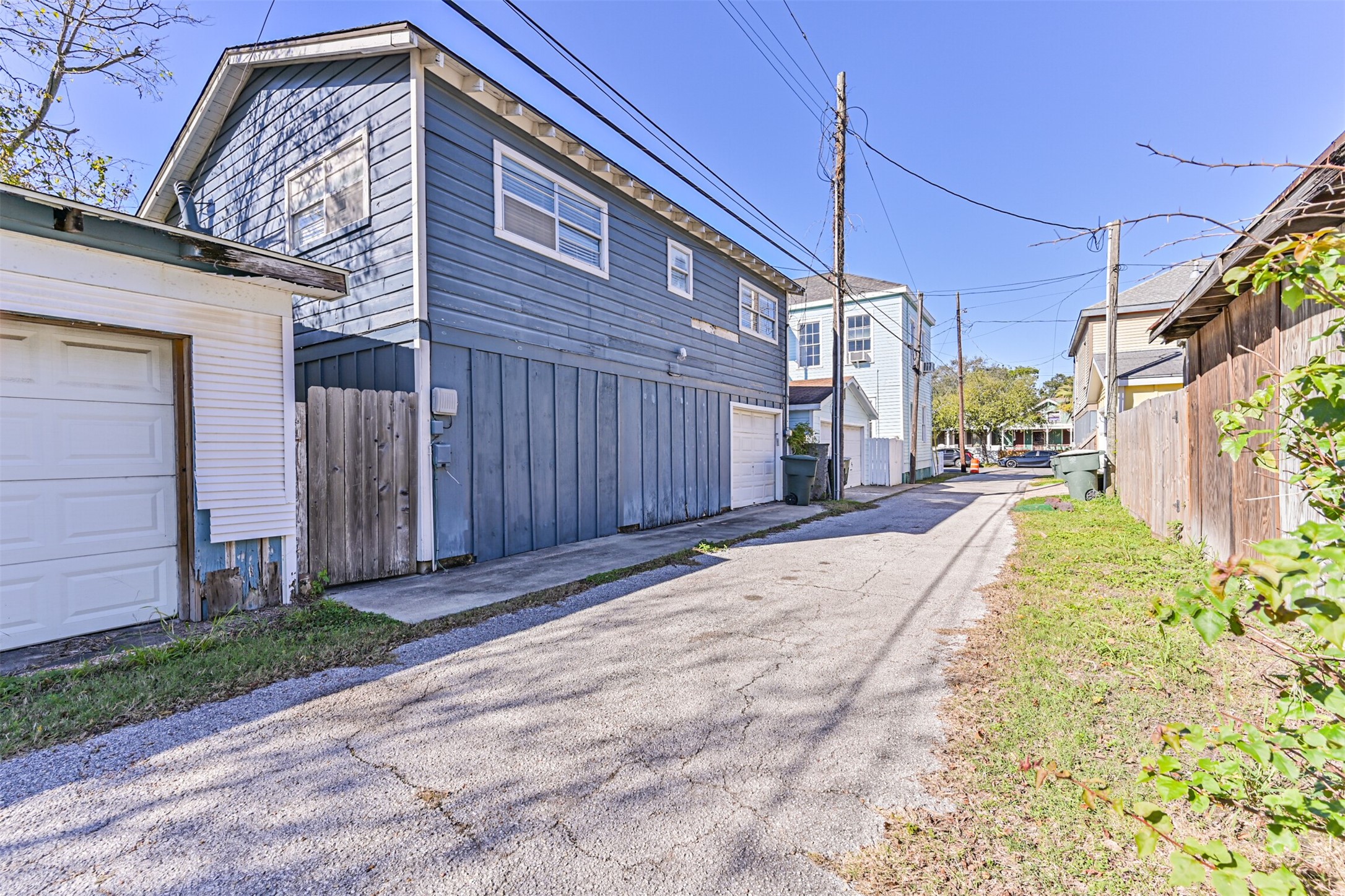 1310 Rosenberg Street Galveston, TX 77550 - Photo 33 of 50 a front view of a house with a yard