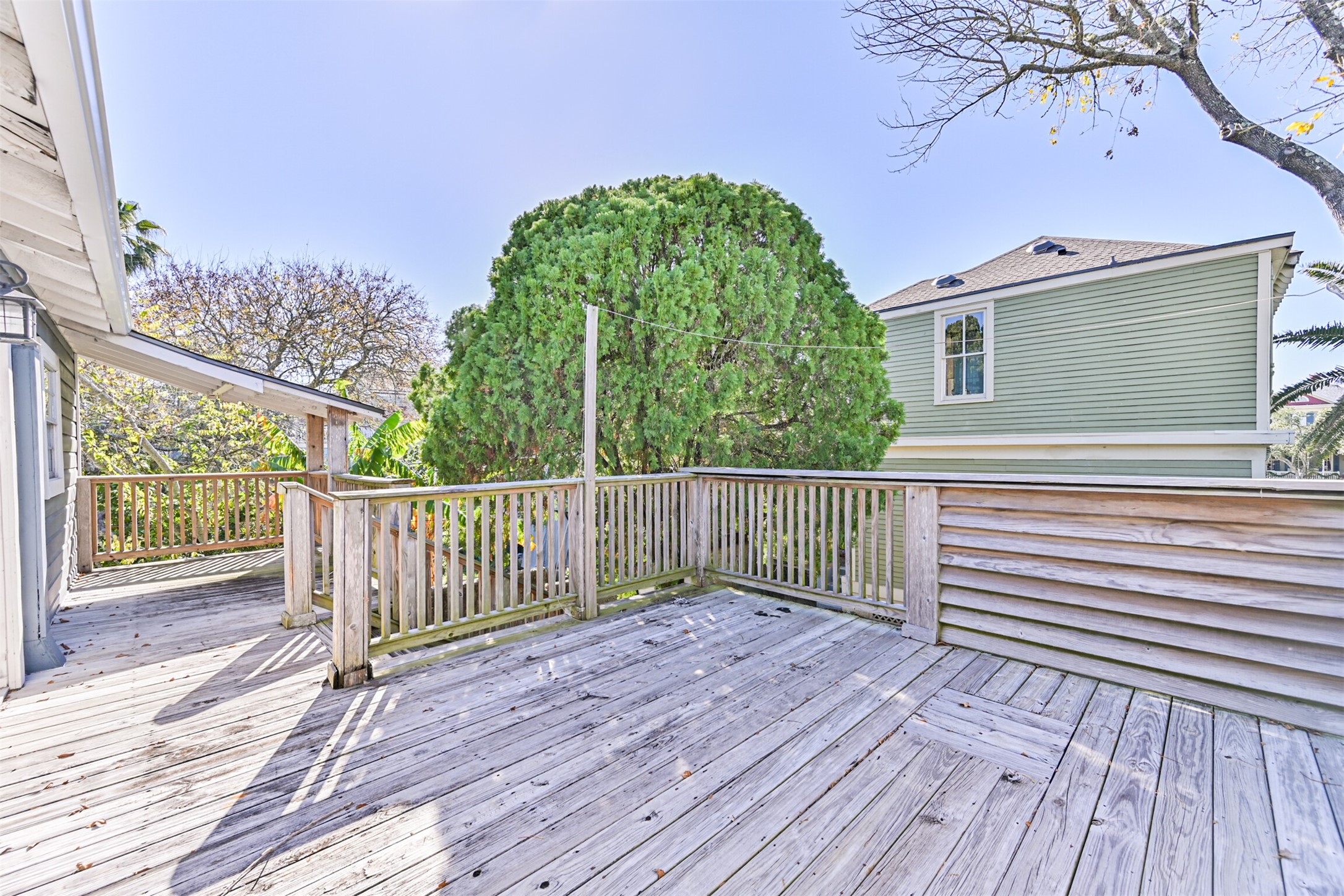 1310 Rosenberg Street Galveston, TX 77550 - Photo 34 of 50 a view of a wooden deck
