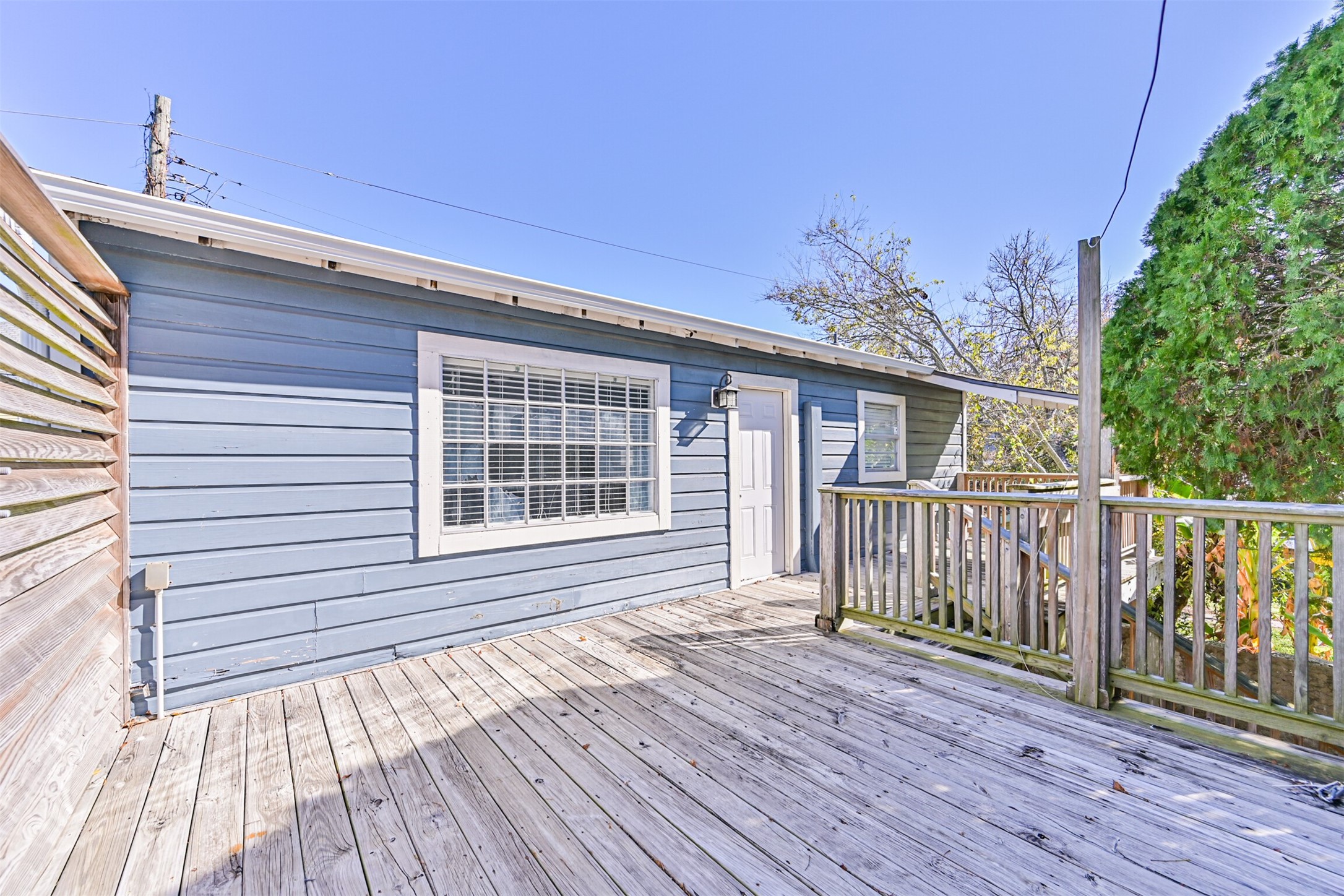 1310 Rosenberg Street Galveston, TX 77550 - Photo 35 of 50 a view of a house with a deck