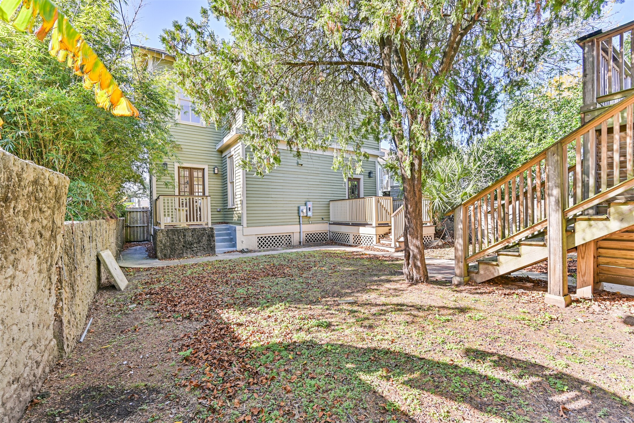 1310 Rosenberg Street Galveston, TX 77550 - Photo 49 of 50 a view of a house with a yard