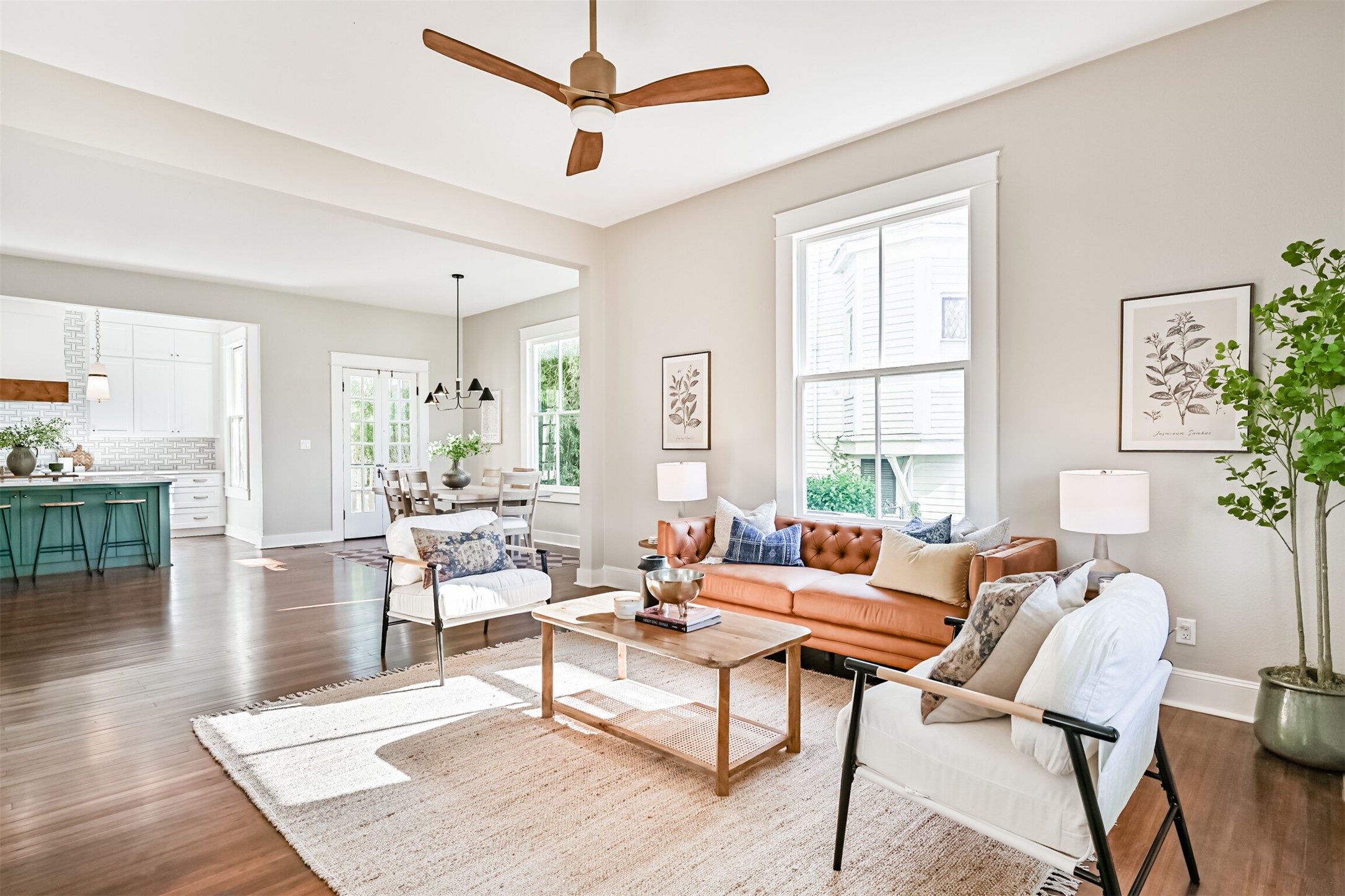 1310 Rosenberg Street Galveston, TX 77550 - Photo 5 of 50 a living room with furniture and a table