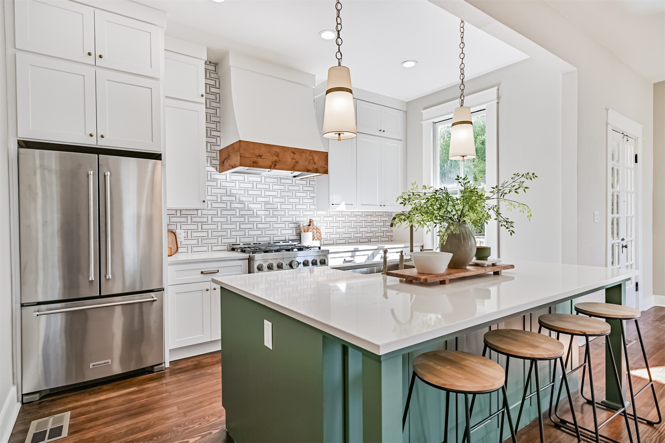 1310 Rosenberg Street Galveston, TX 77550 - Photo 10 of 50 a kitchen with stainless steel appliances granite countertop a sink refrigerator and microwave