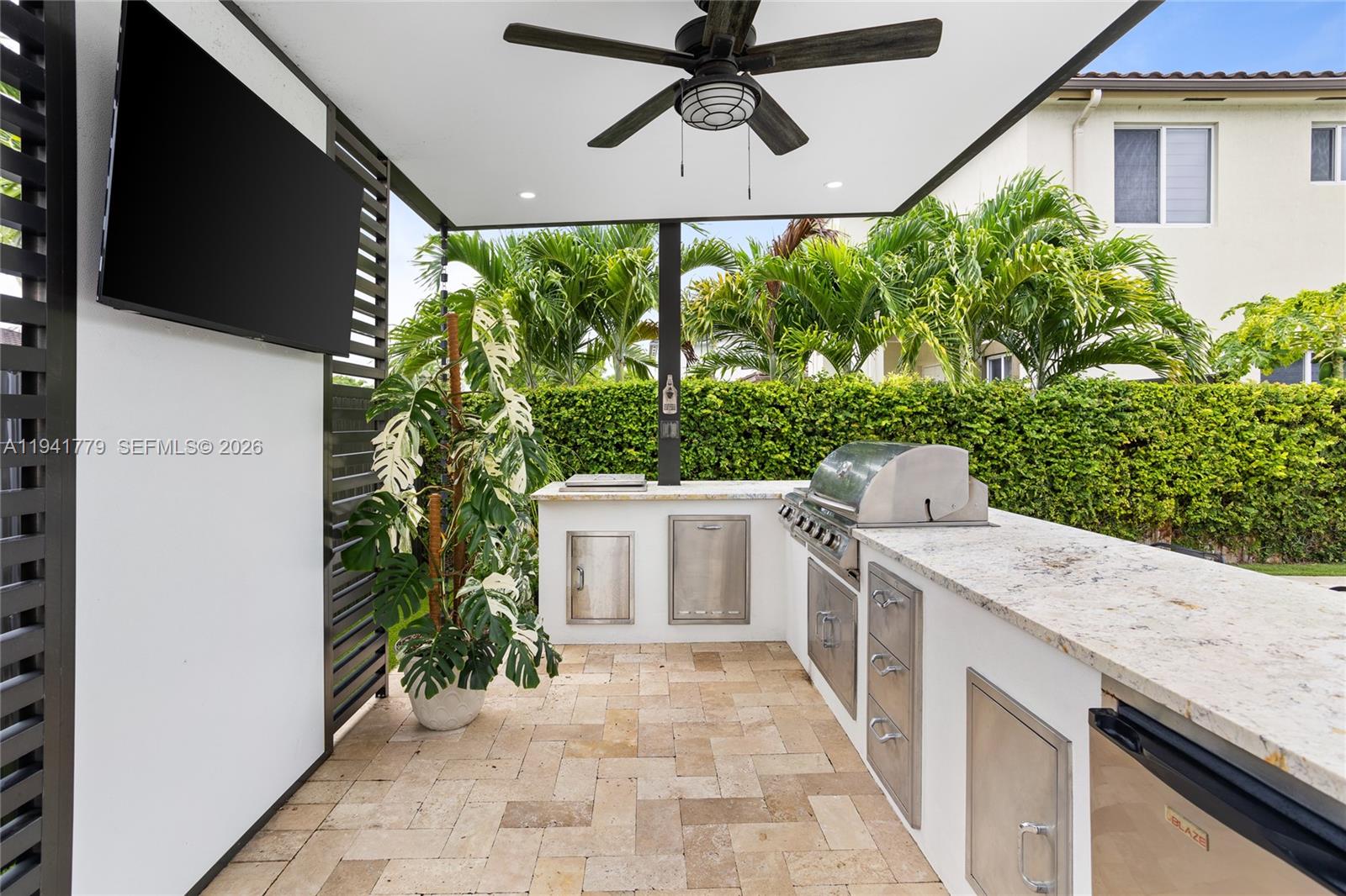 5324 Southwest 164th Court Miami, FL 33185 - Photo 11 of 47 a view of an outdoor kitchen