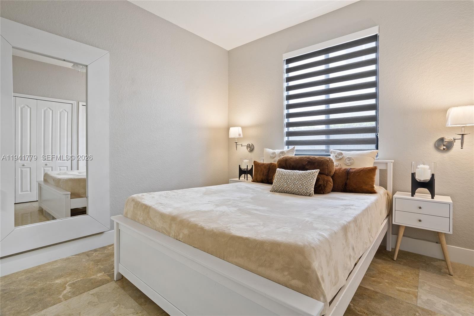 5324 Southwest 164th Court Miami, FL 33185 - Photo 41 of 47 a bedroom with a bed and a window