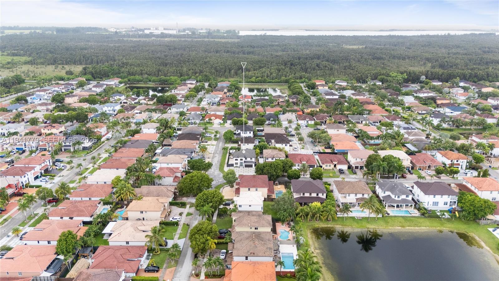 5324 Southwest 164th Court Miami, FL 33185 - Photo 47 of 47 an aerial view of residential houses with outdoor space and river