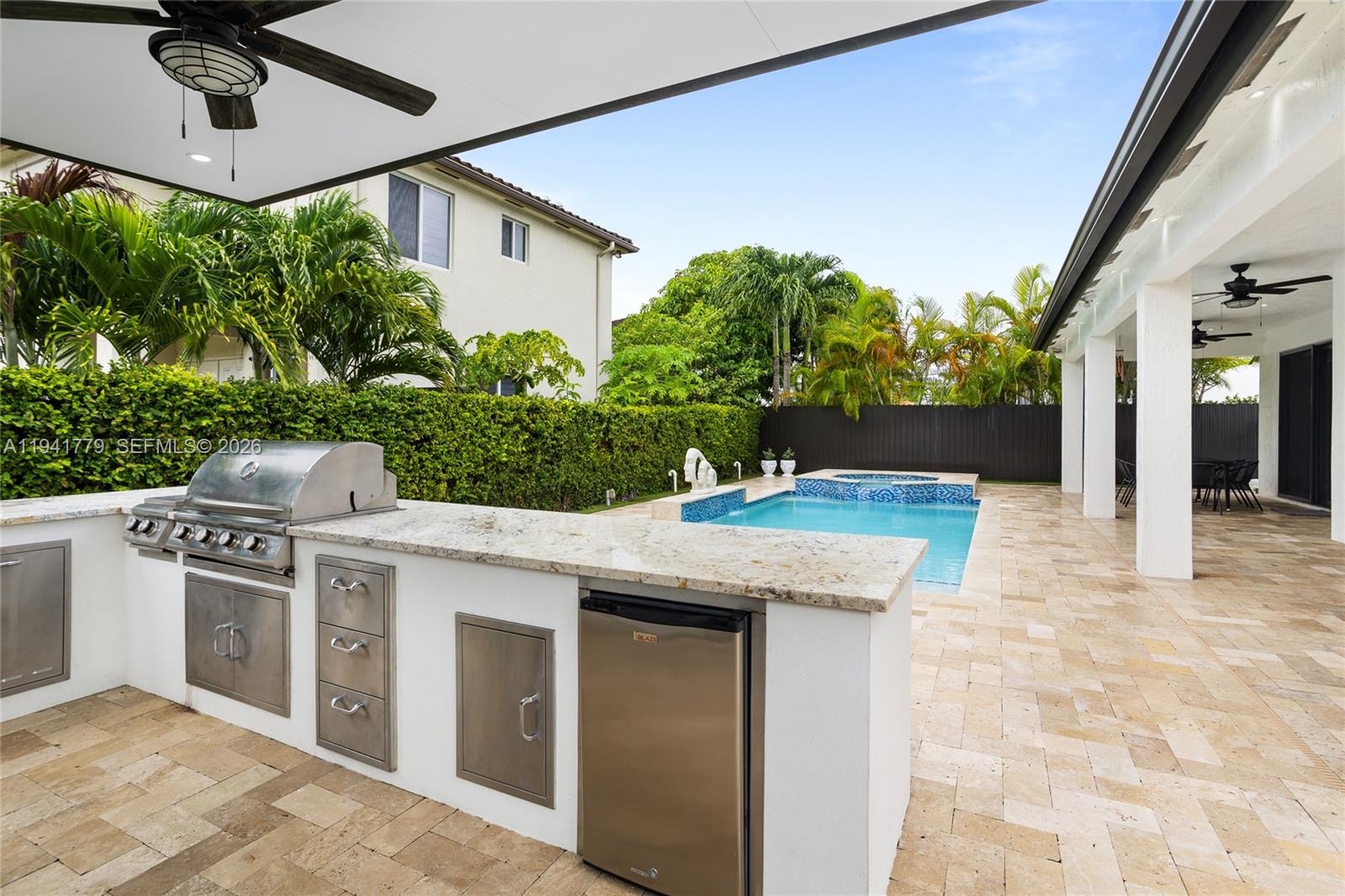 5324 Southwest 164th Court Miami, FL 33185 - Photo 10 of 47 a view of a house with a sink and backyard