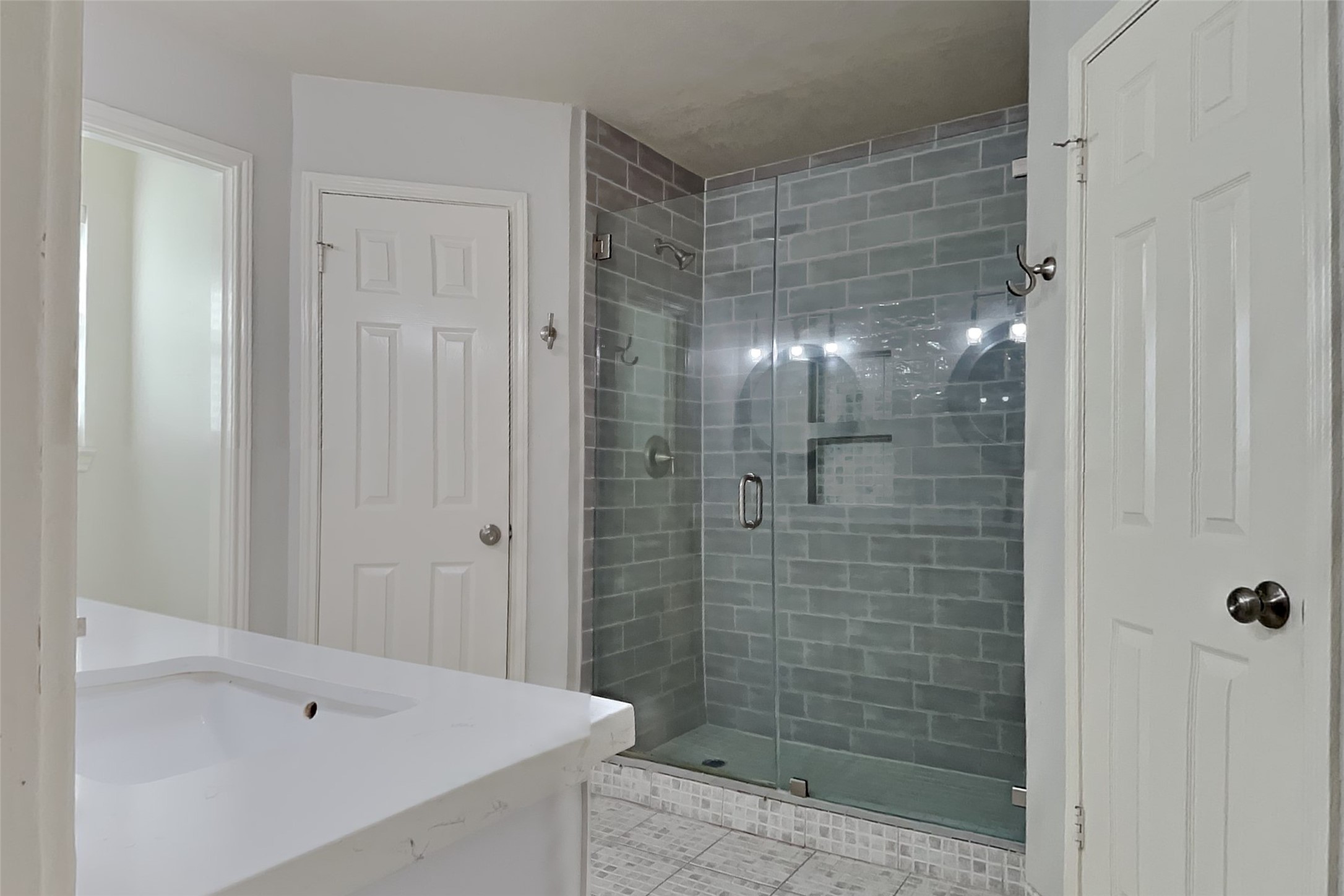 40 Rockfern Road Spring, TX 77380 - Photo 11 of 19 a bathroom with a shower and a sink