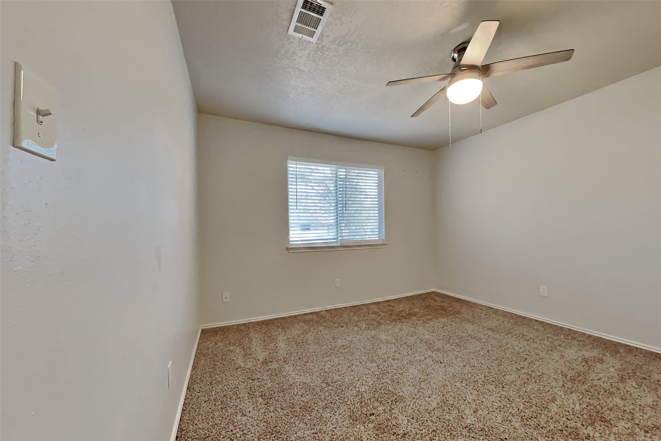 40 Rockfern Road Spring, TX 77380 - Photo 12 of 19 an empty room with a window