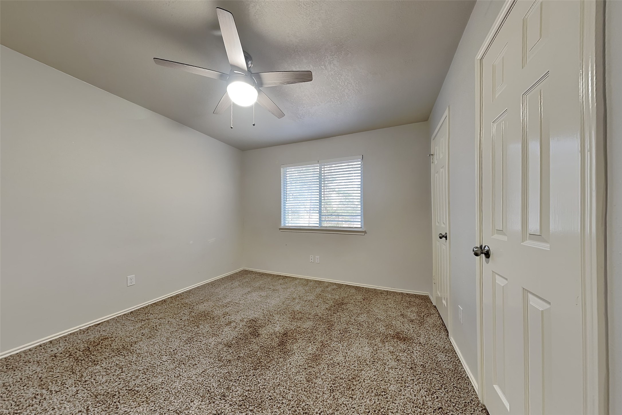 40 Rockfern Road Spring, TX 77380 - Photo 13 of 19 wooden floor in an empty room with a window