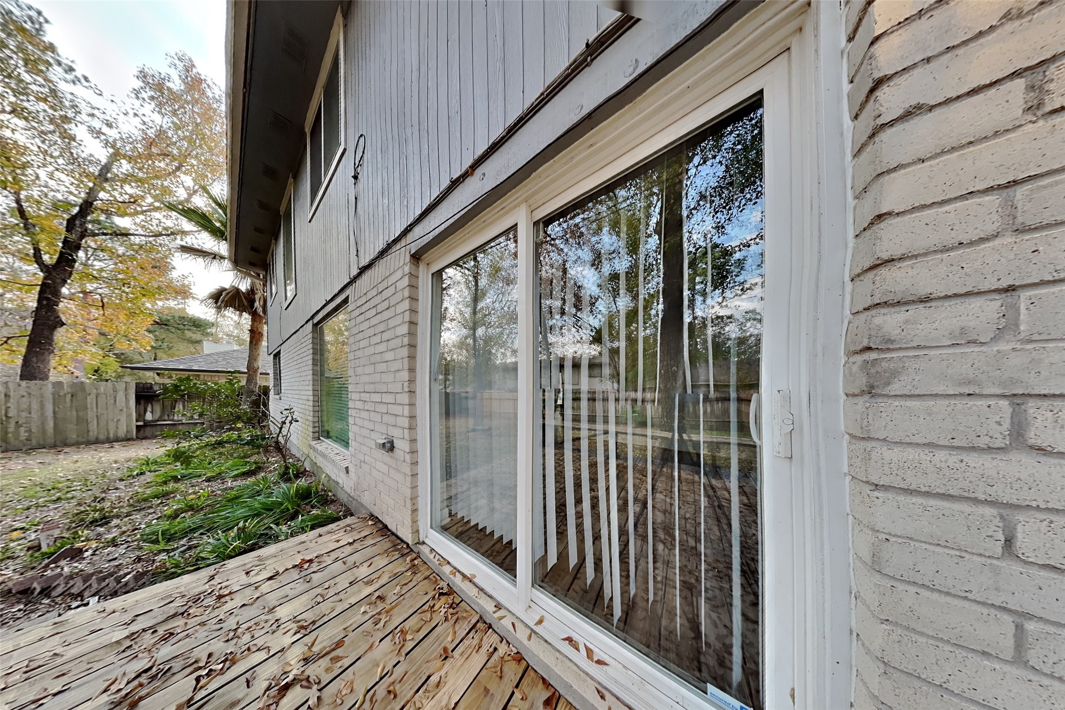 40 Rockfern Road Spring, TX 77380 - Photo 16 of 19 a view of a balcony with wooden floor
