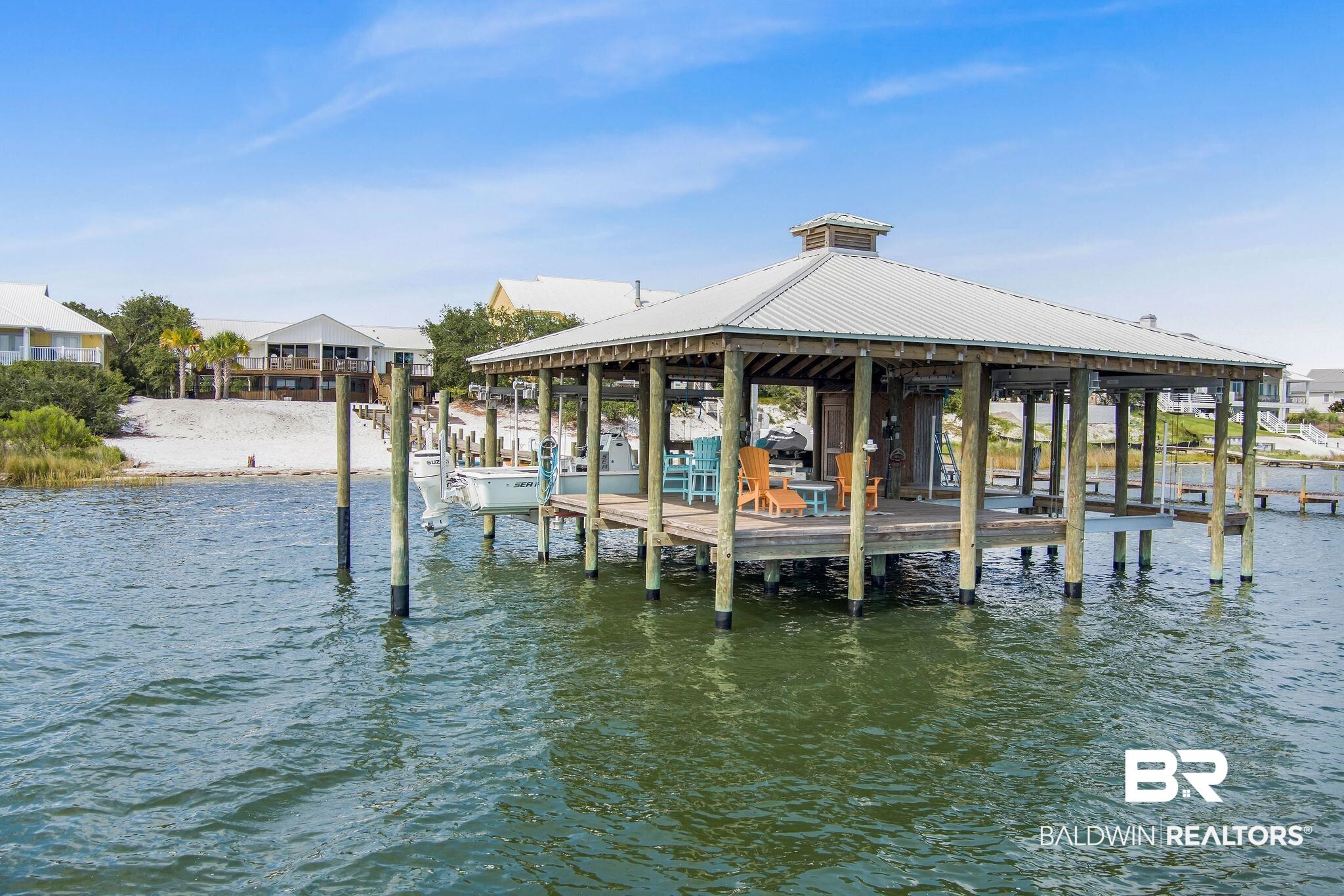 32130 River Road Orange Beach, AL 36561 - Photo 47 of 51 Dock area featuring a water view and boat lift