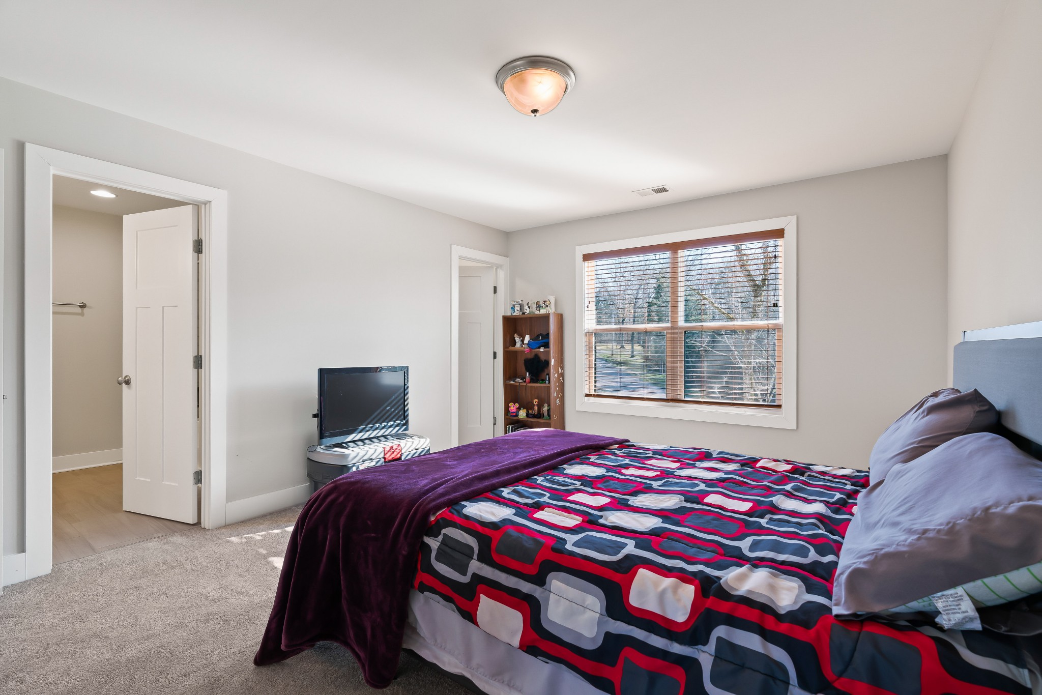 2350 Cooks Road Mount Juliet, TN 37122 - Photo 17 of 57 a bedroom with a bed and a window