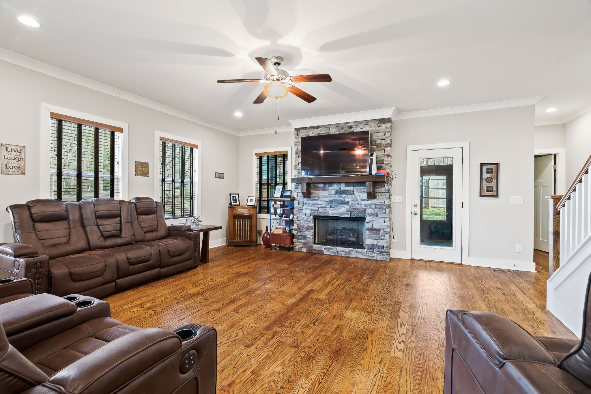 2350 Cooks Road Mount Juliet, TN 37122 - Photo 2 of 57 a living room with furniture a fireplace and a flat screen tv