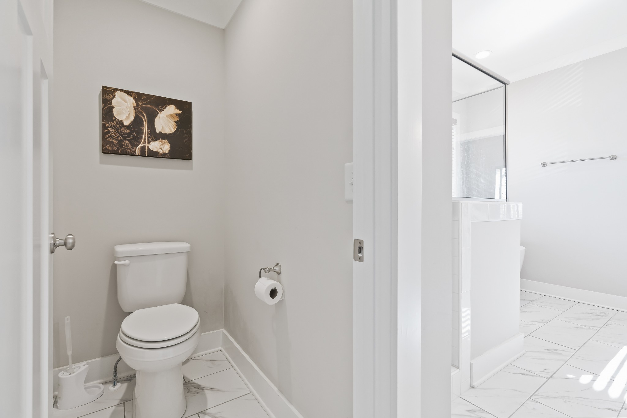 2350 Cooks Road Mount Juliet, TN 37122 - Photo 32 of 57 a white toilet sitting next to a white walls
