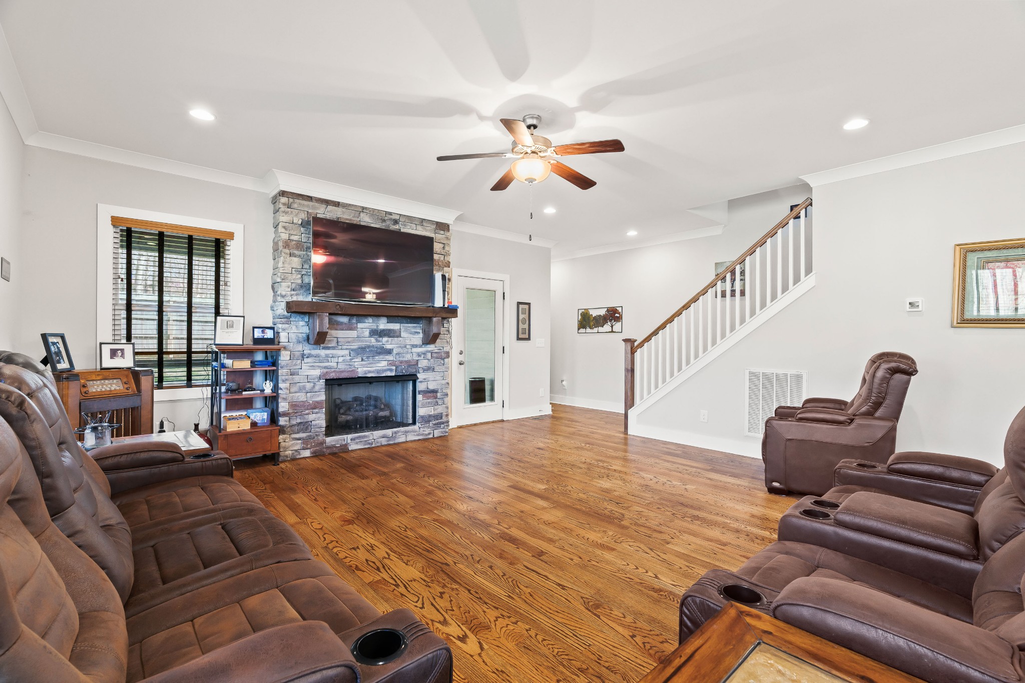 2350 Cooks Road Mount Juliet, TN 37122 - Photo 35 of 57 a living room with furniture a fireplace and a flat screen tv