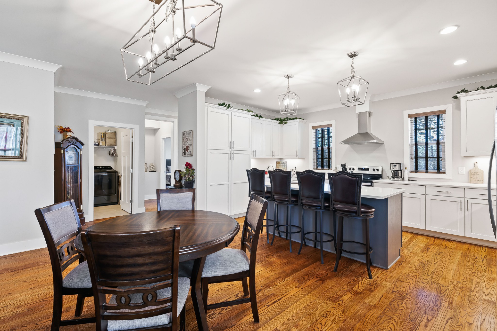 2350 Cooks Road Mount Juliet, TN 37122 - Photo 38 of 57 a view of a dining room with furniture and wooden floor