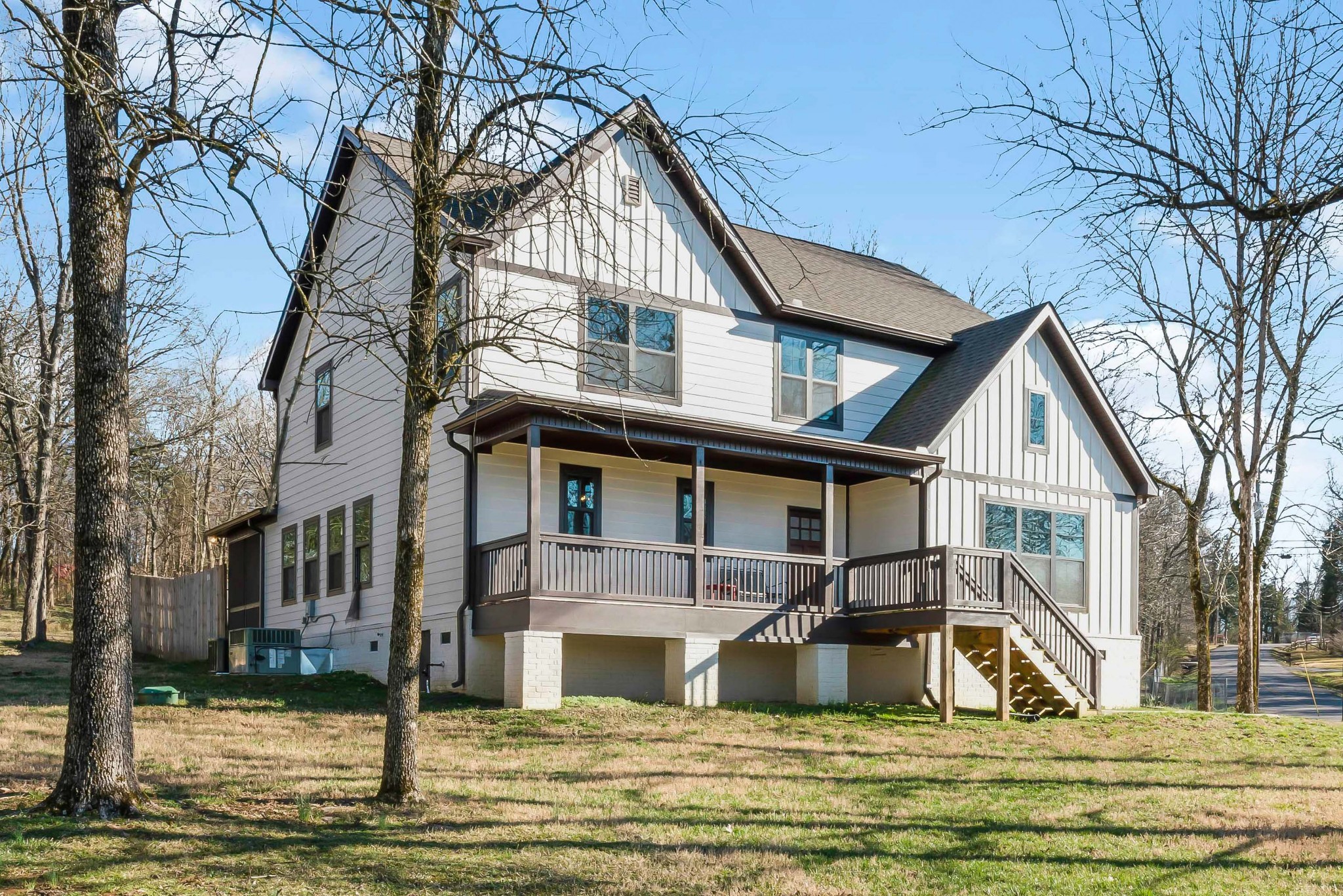 2350 Cooks Road Mount Juliet, TN 37122 - Photo 45 of 57 a view of a white house with a yard and a large tree