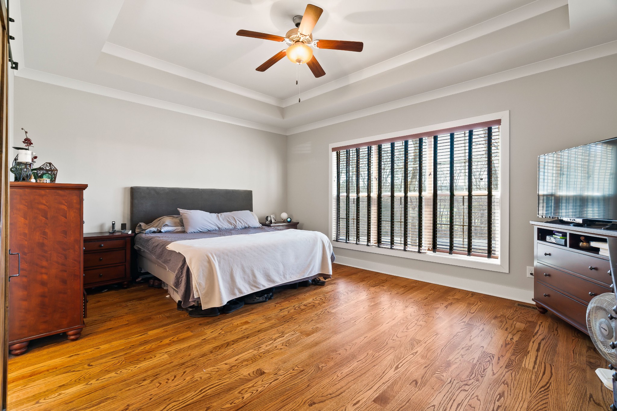 2350 Cooks Road Mount Juliet, TN 37122 - Photo 5 of 57 a bedroom with a bed and a chandelier