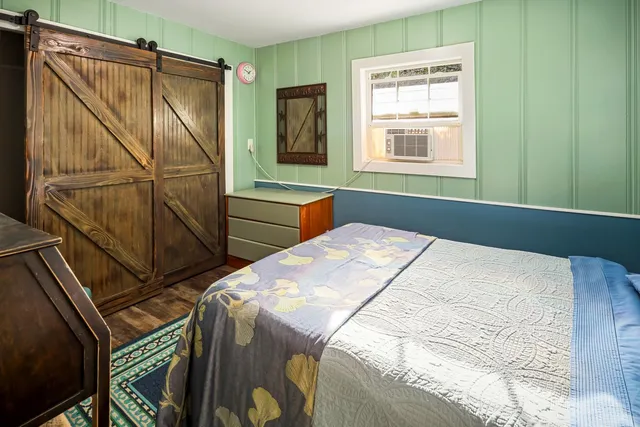 a view of bathroom with window and washer