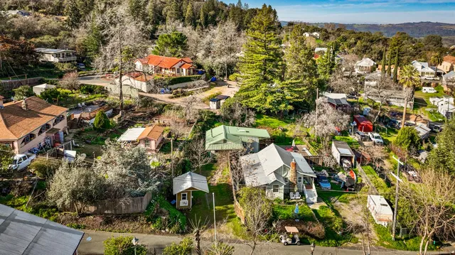 an aerial view of residential building and parking space