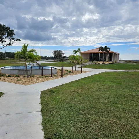 a view of a garden with houses