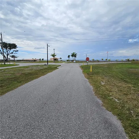 a view of a lake with a big yard