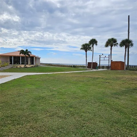 a view of a building and a yard