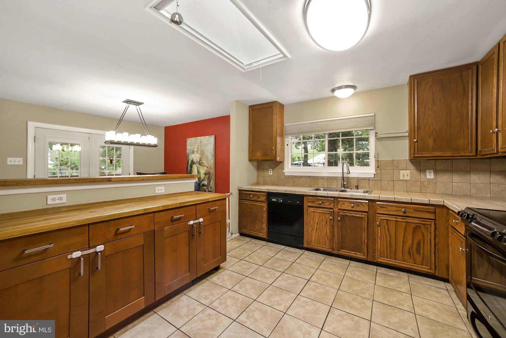 8429 Oak Stream Drive Laurel, MD 20708 - Photo 11 of 37 Kitchen with skylight