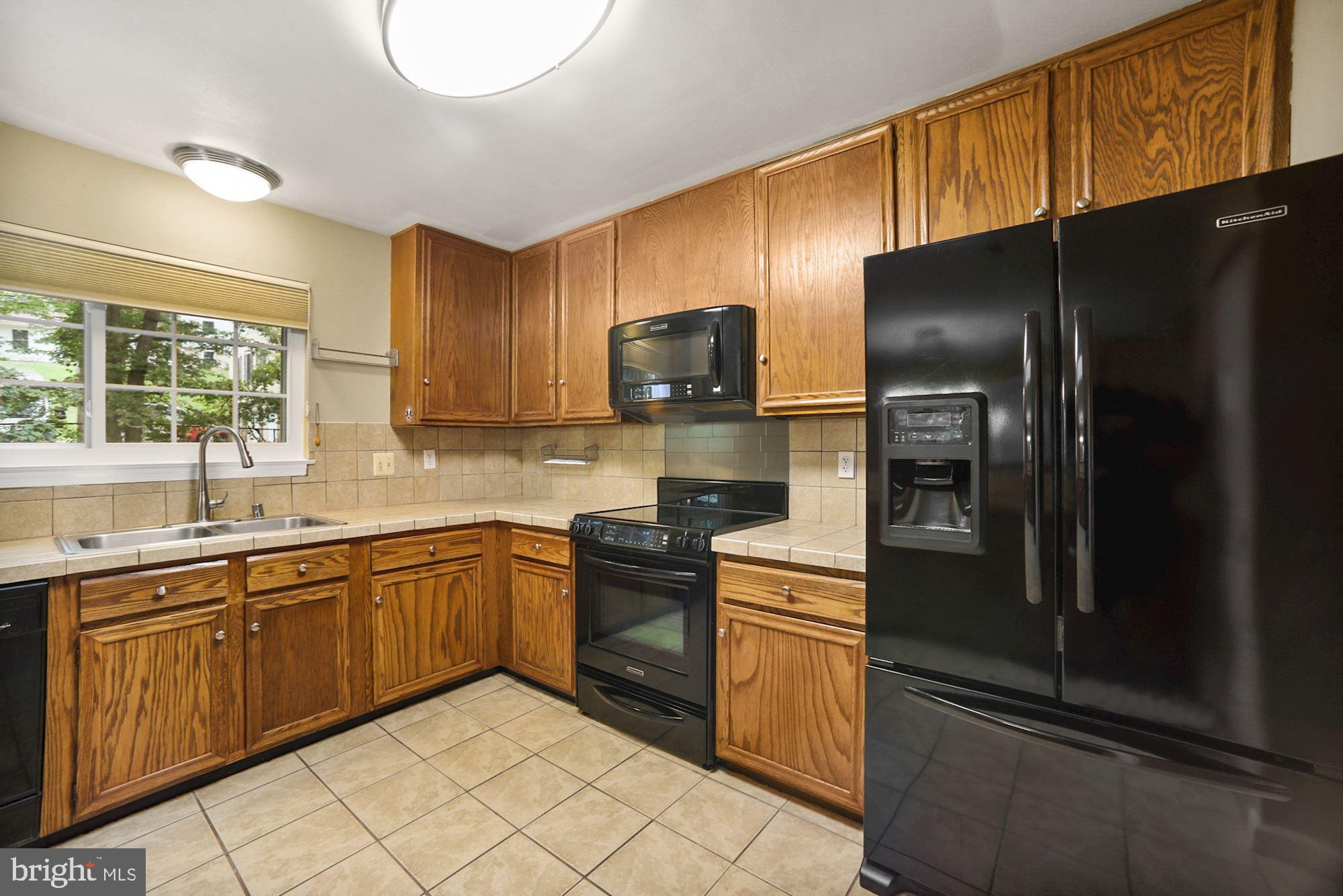 8429 Oak Stream Drive Laurel, MD 20708 - Photo 12 of 37 Updated Kitchen Aid appliances