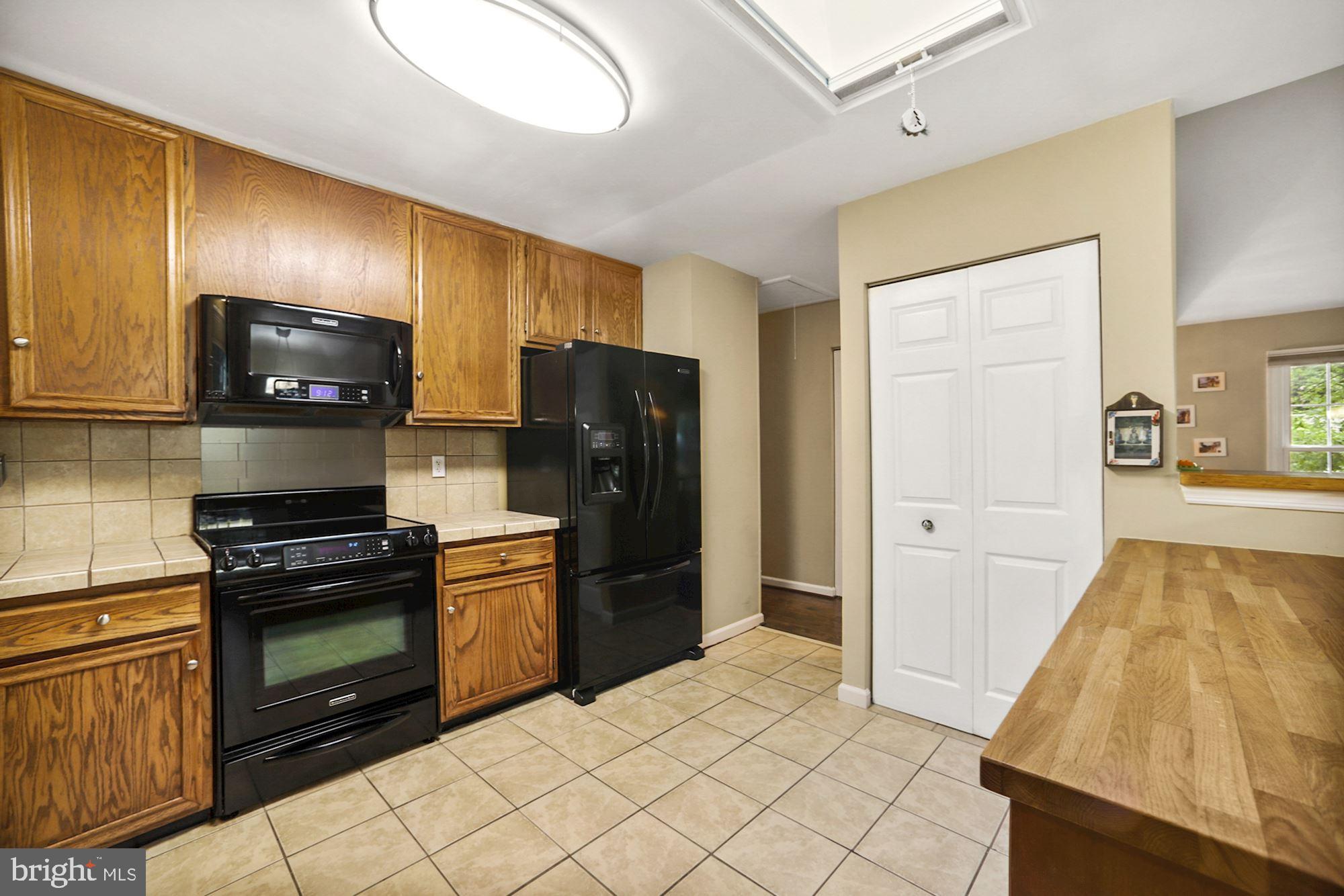 8429 Oak Stream Drive Laurel, MD 20708 - Photo 13 of 37 Pentry with pull out shelves