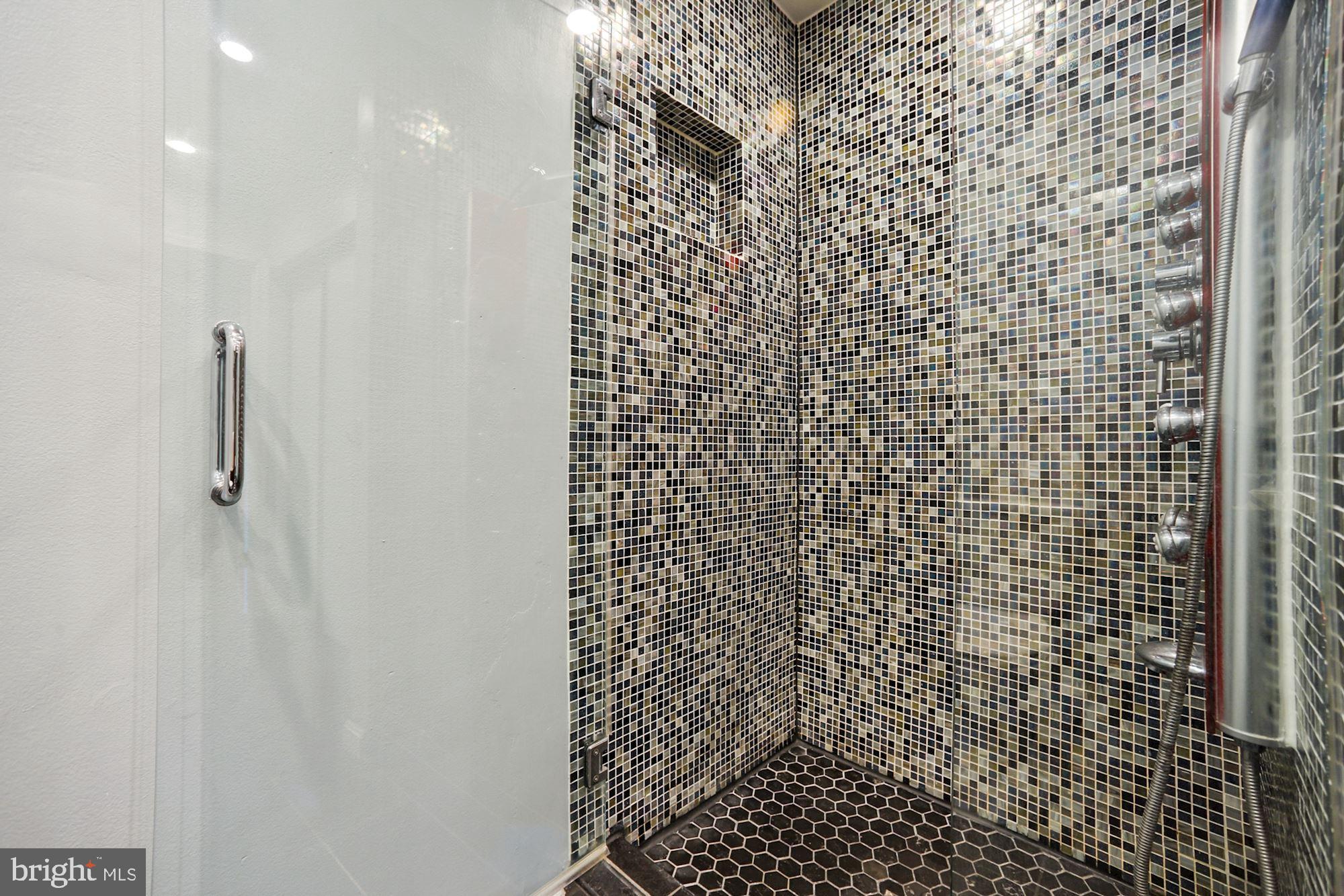 8429 Oak Stream Drive Laurel, MD 20708 - Photo 18 of 37 Glass tile shower with multiple sprayers